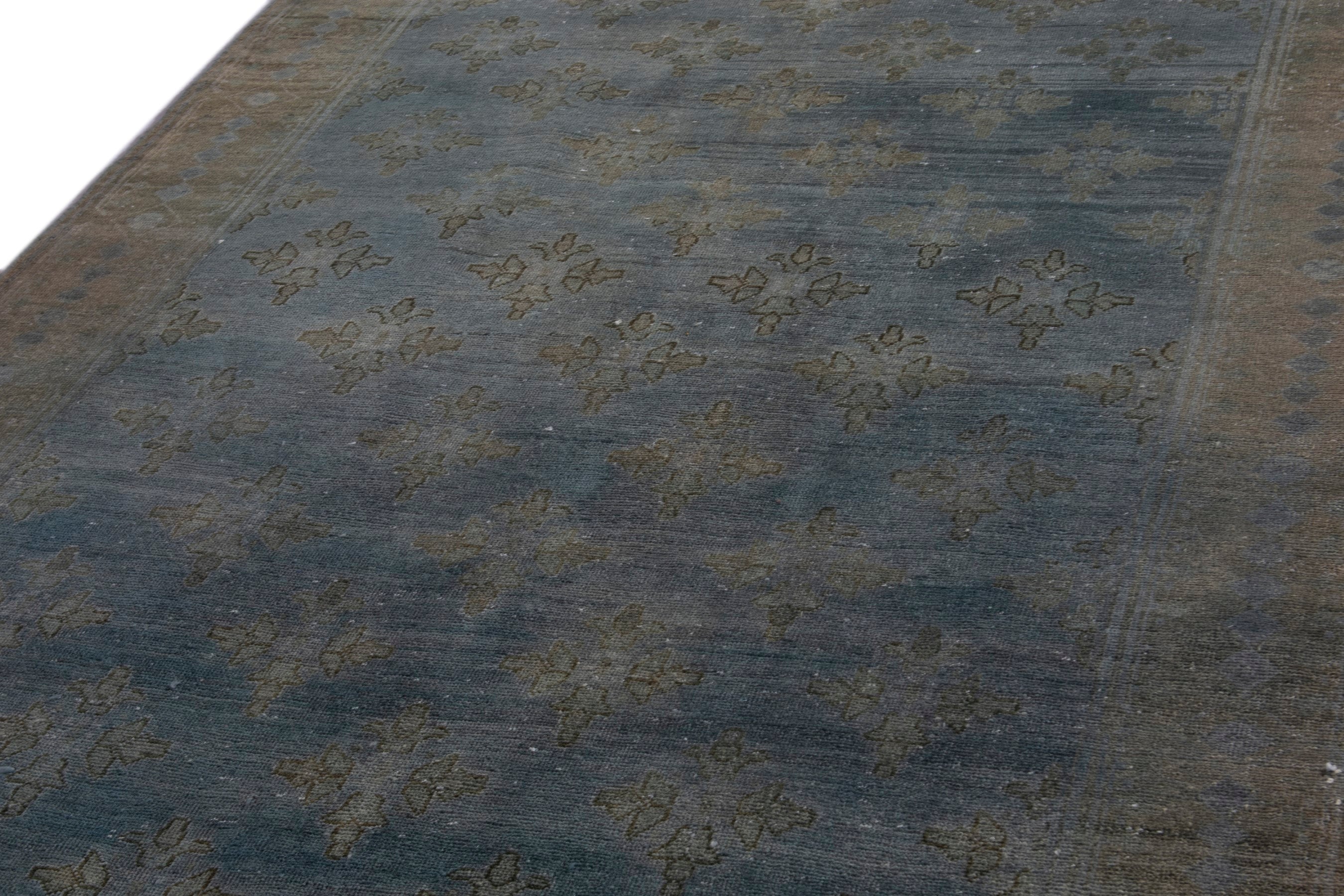 Persian Lori area rug in slate blue and terracotta, view 9 of 21