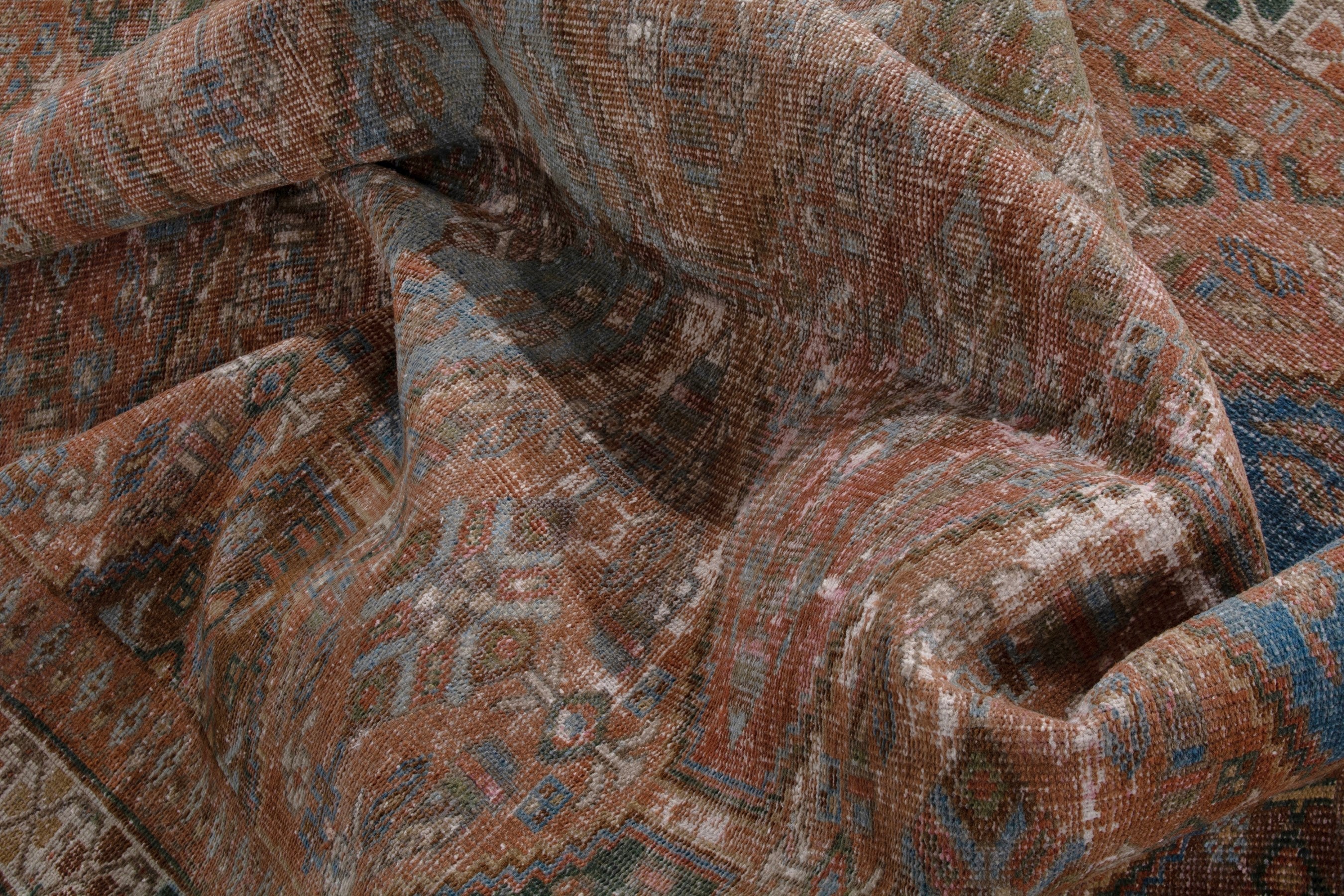Persian Shiraz area rug in rust and teal, view 19 of 20