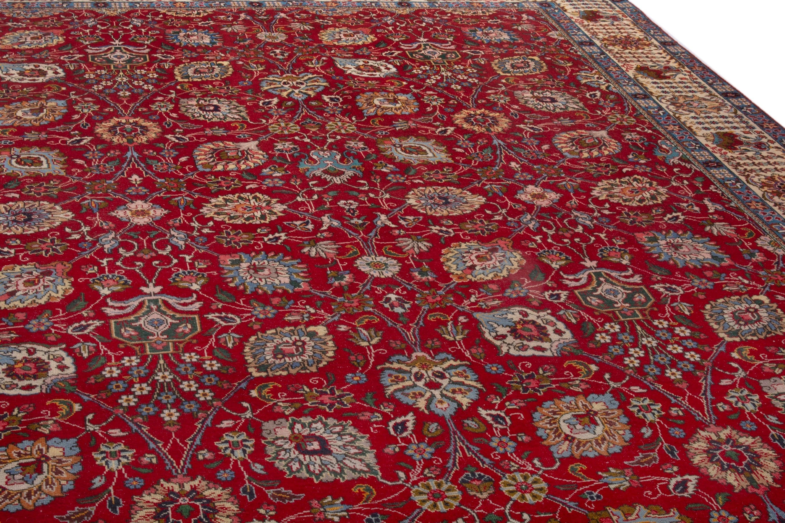 Persian Tabriz oversized rug in deep red and cream, view 9 of 20