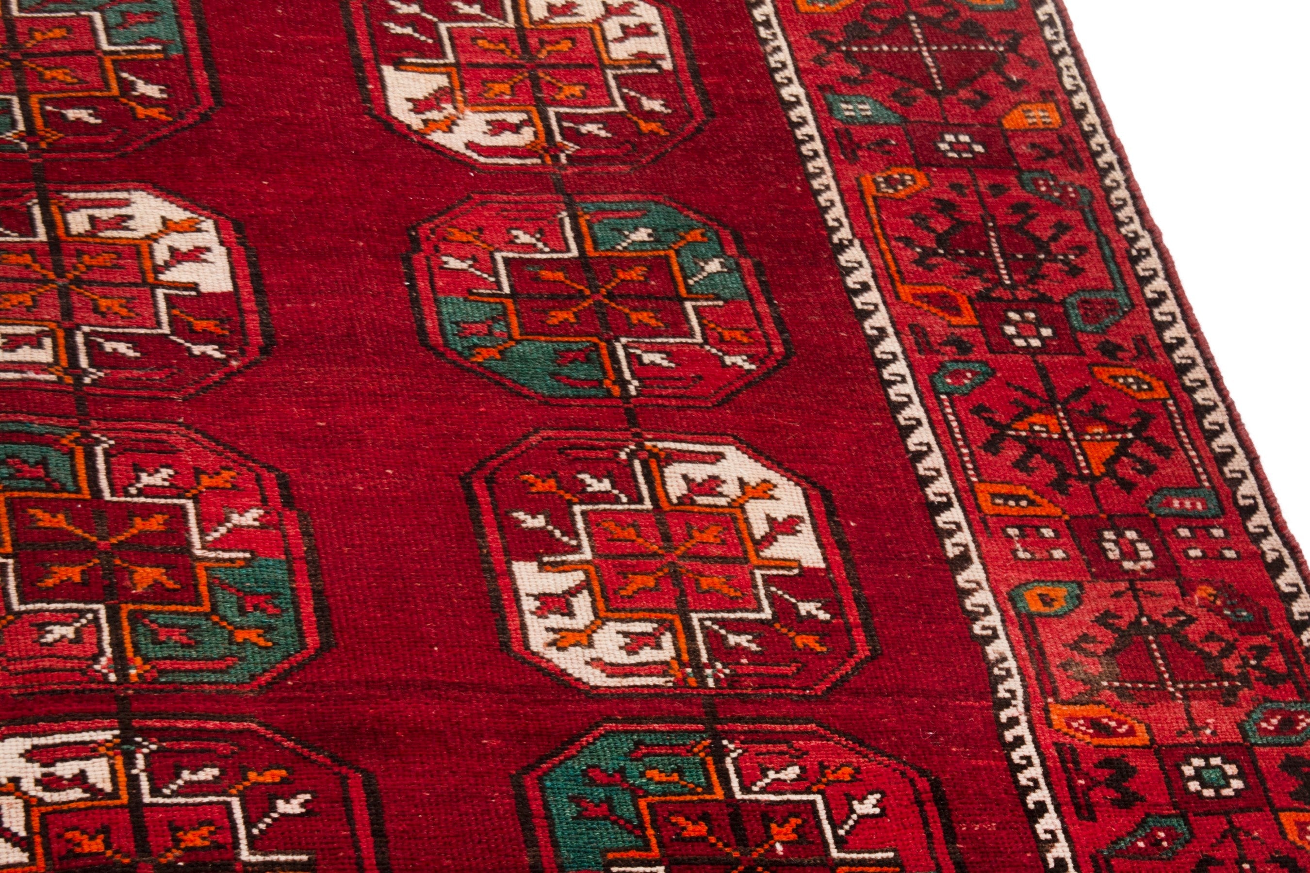 Persian Ghoochan area rug in deep red and burgundy, view 7 of 22