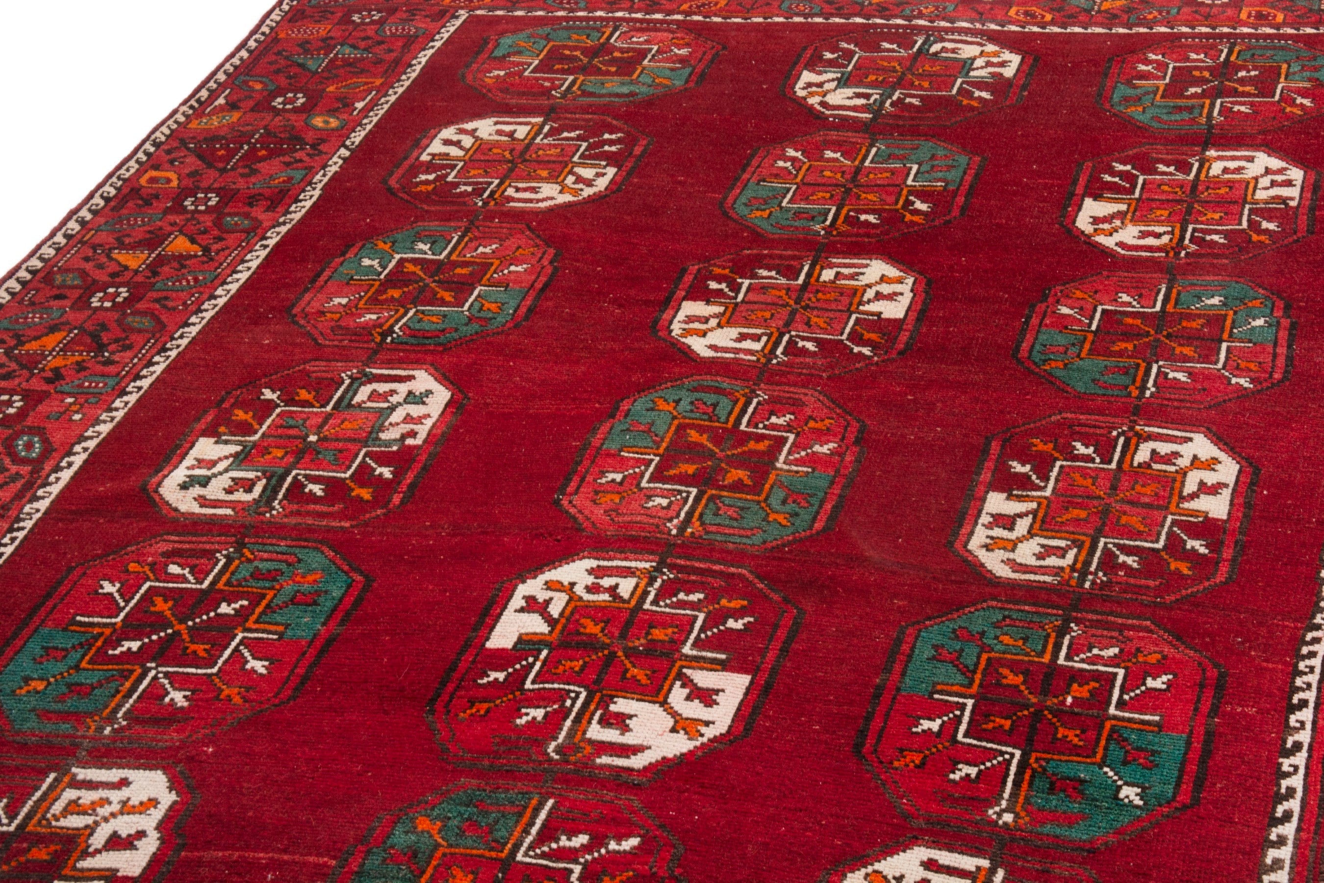 Persian Ghoochan area rug in deep red and burgundy, view 8 of 22