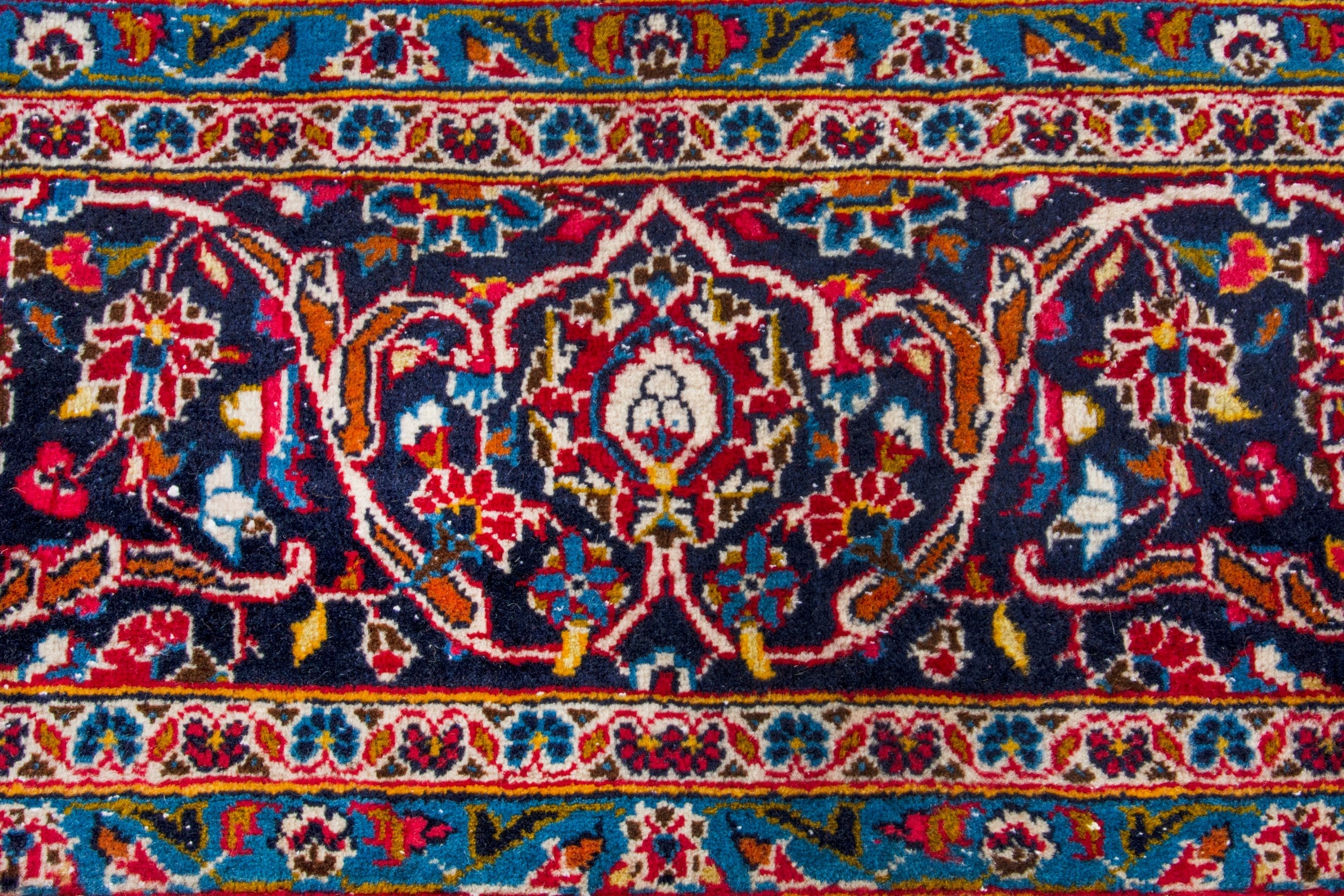 Persian Kashan oversized rug in deep red and navy, view 11 of 20