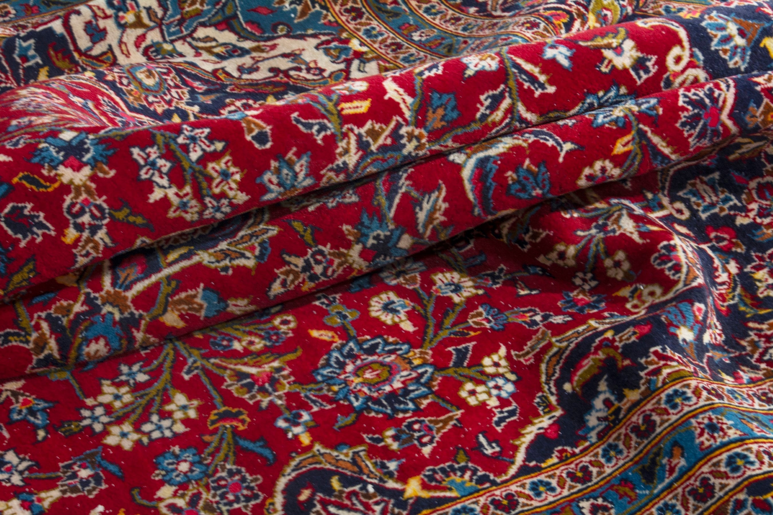 Persian Kashan oversized rug in deep red and navy, view 16 of 20