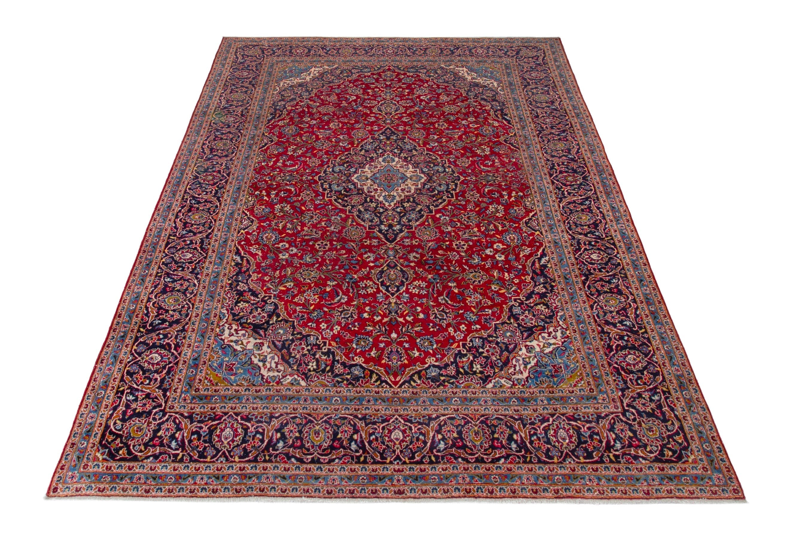 Persian Kashan oversized rug in deep red and navy, view 3 of 20