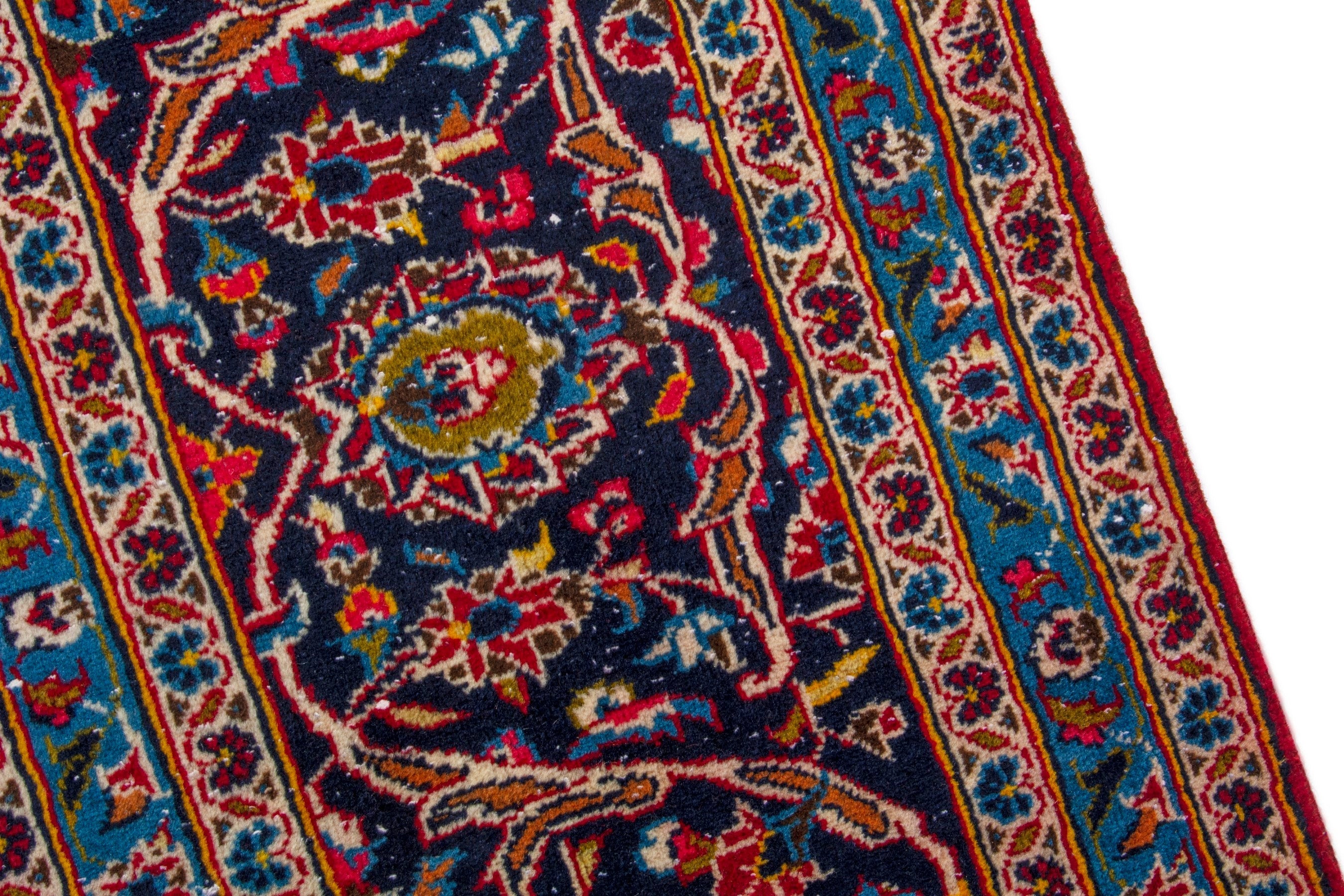 Persian Kashan oversized rug in deep red and navy, view 7 of 20