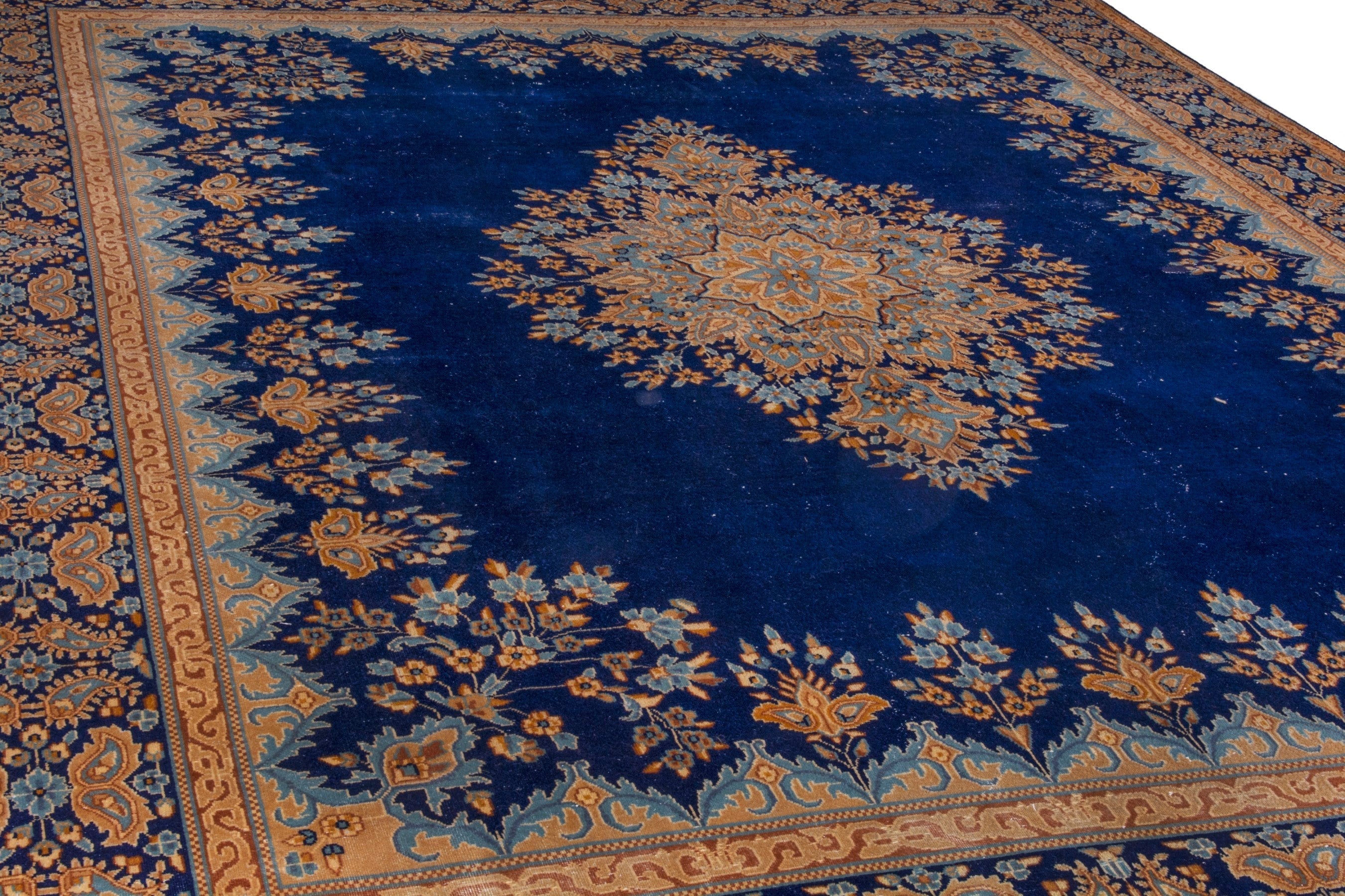 Persian Kerman oversized rug in navy and antique gold, view 9 of 26