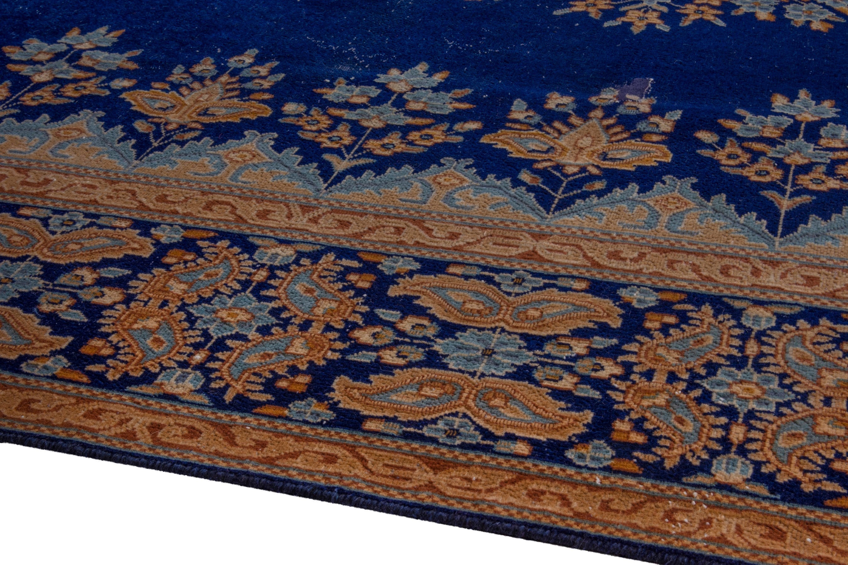 Persian Kerman oversized rug in navy and antique gold, view 6 of 26