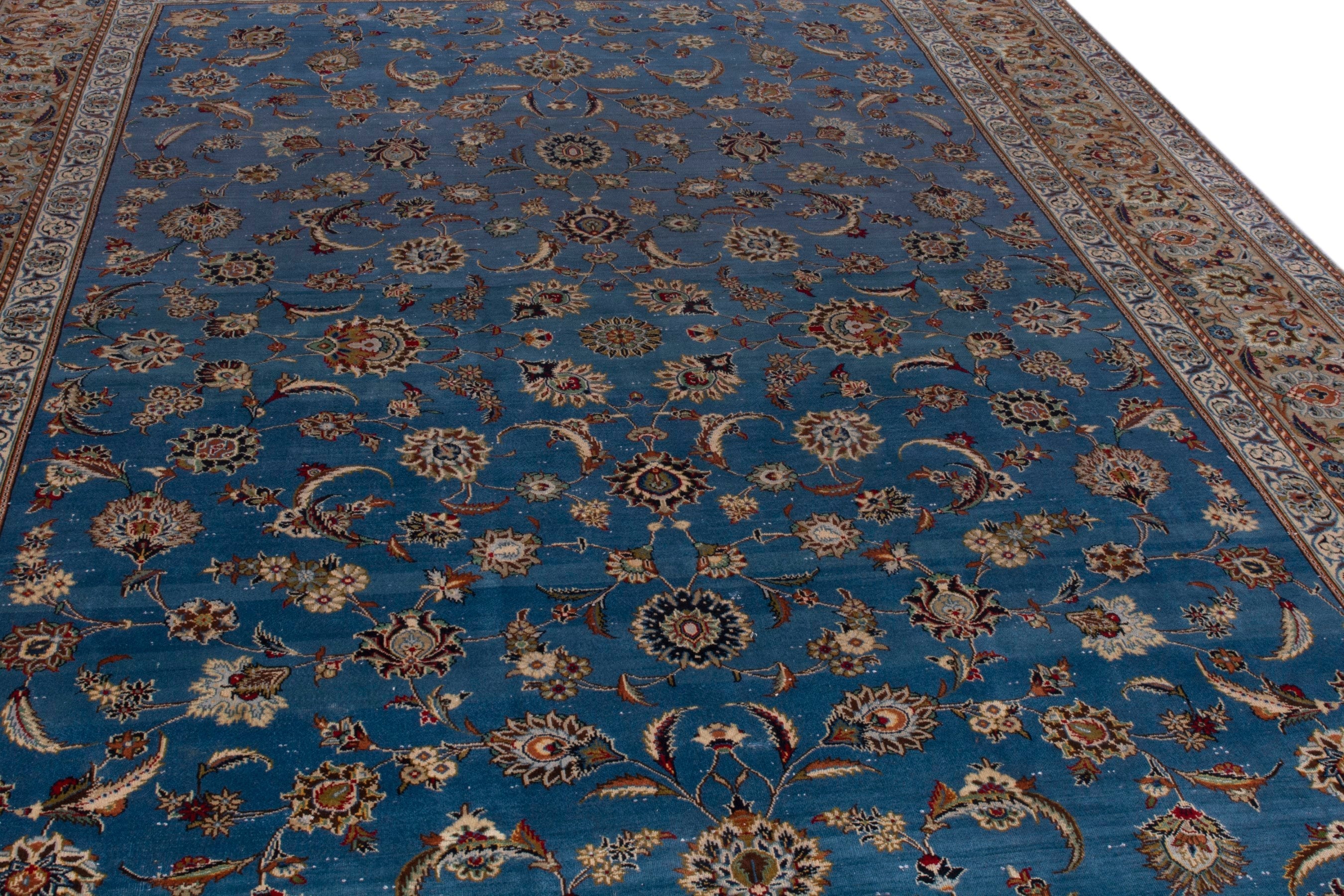 Persian Kashan oversized rug in blue and brown, view 9 of 23