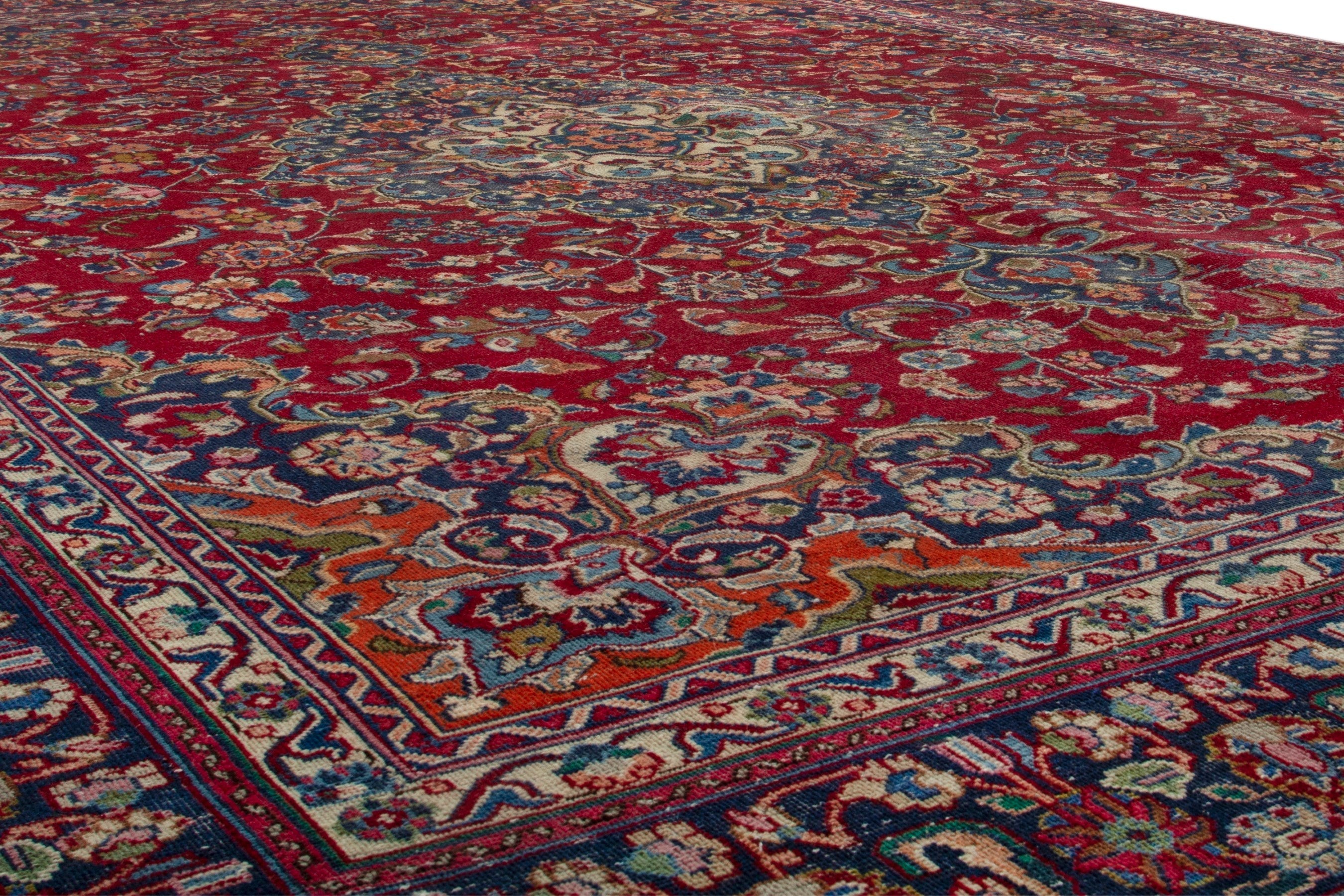 Persian Mashhad oversized rug in deep red and burgundy, view 9 of 19