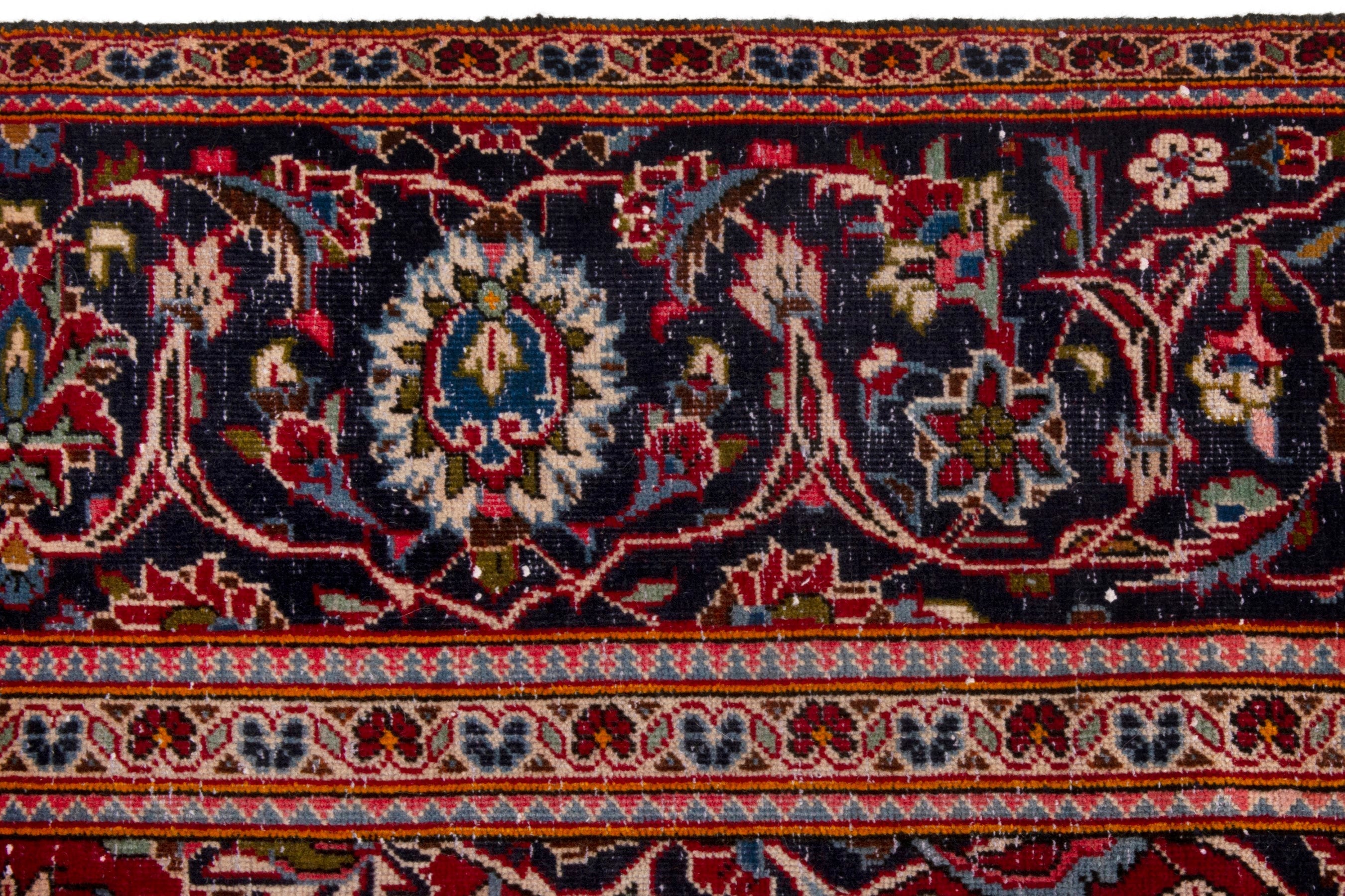 Persian Kashan oversized rug in deep red and navy, view 12 of 20