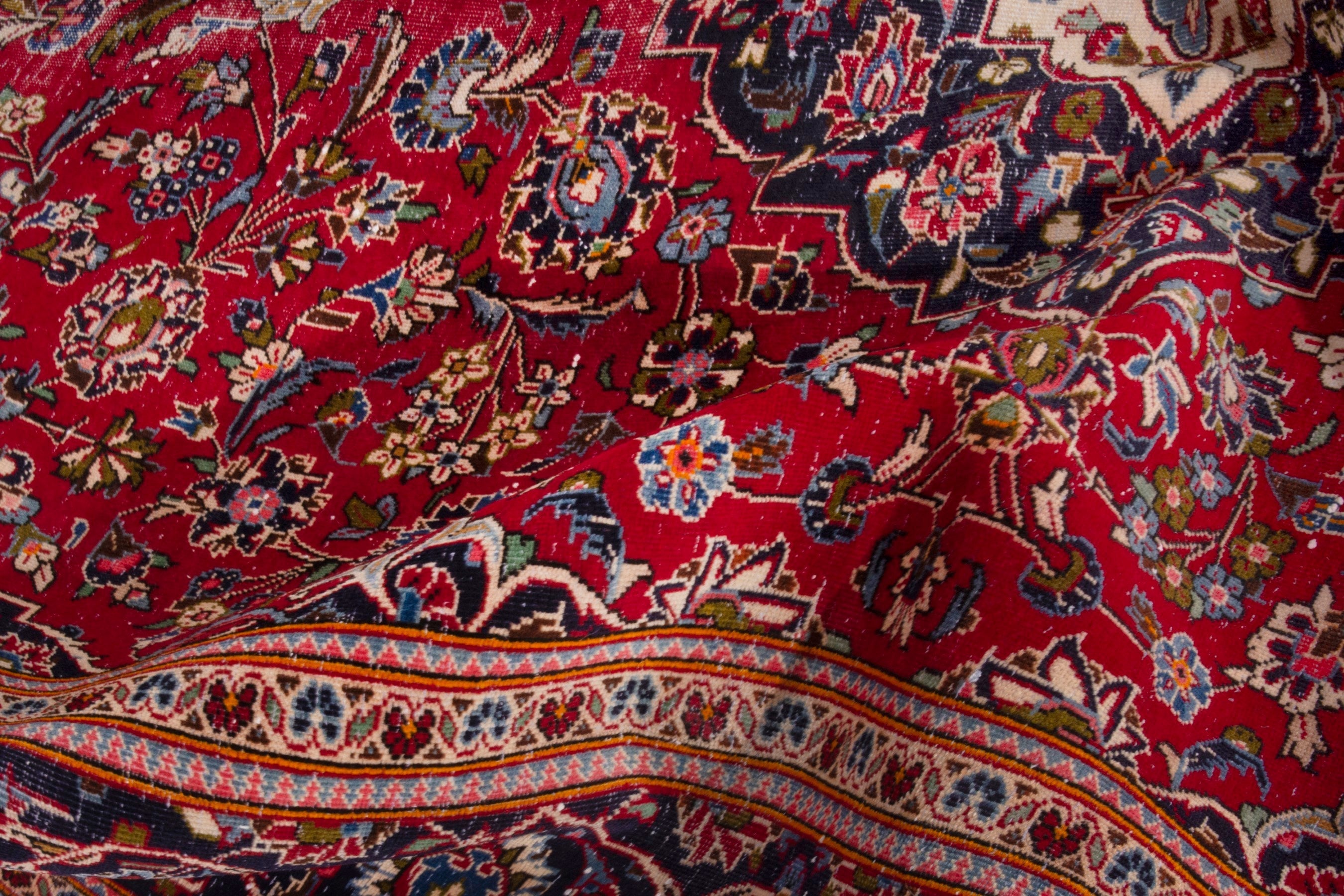 Persian Kashan oversized rug in deep red and navy, view 19 of 20