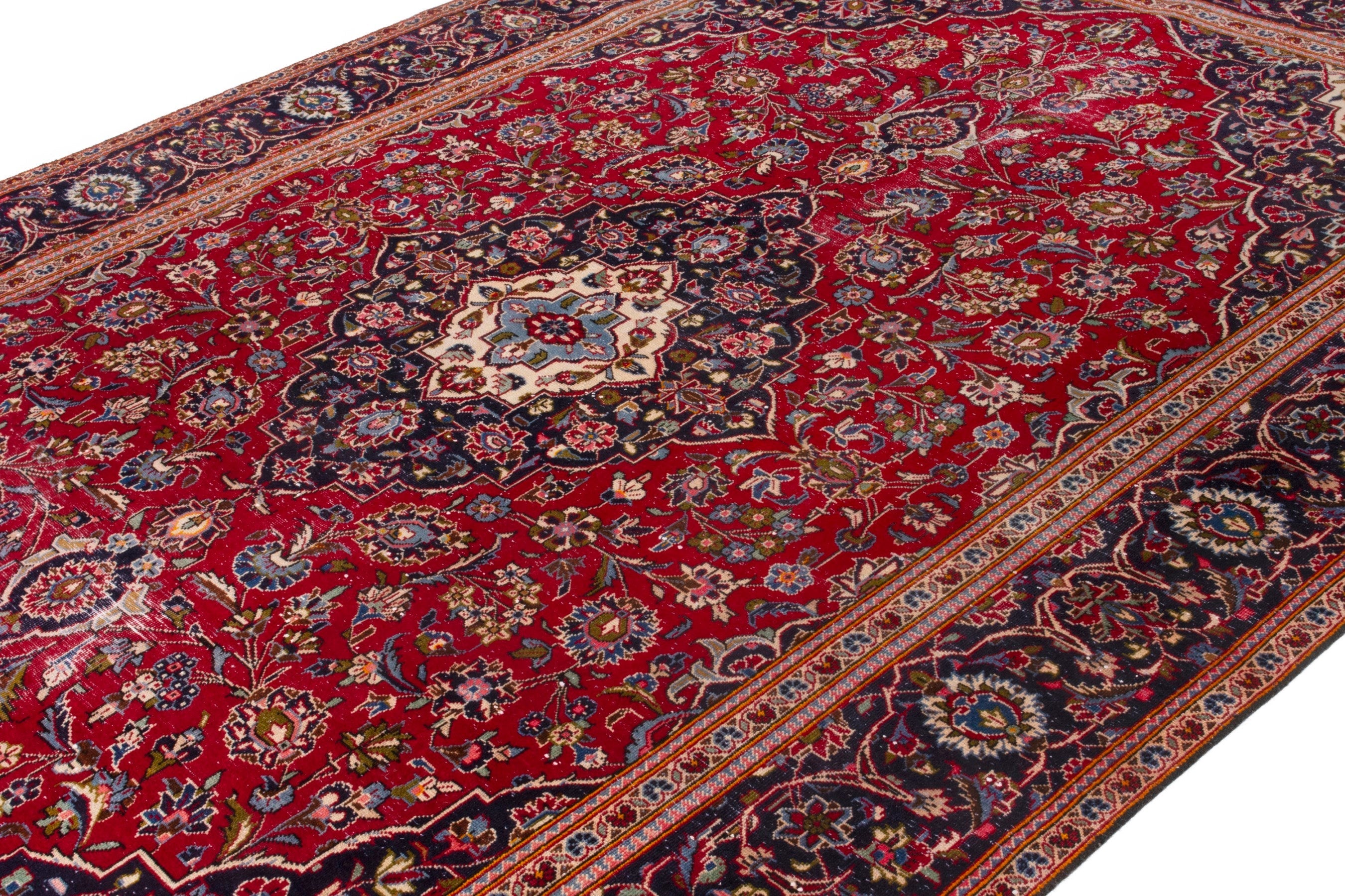 Persian Kashan oversized rug in deep red and navy, view 5 of 20