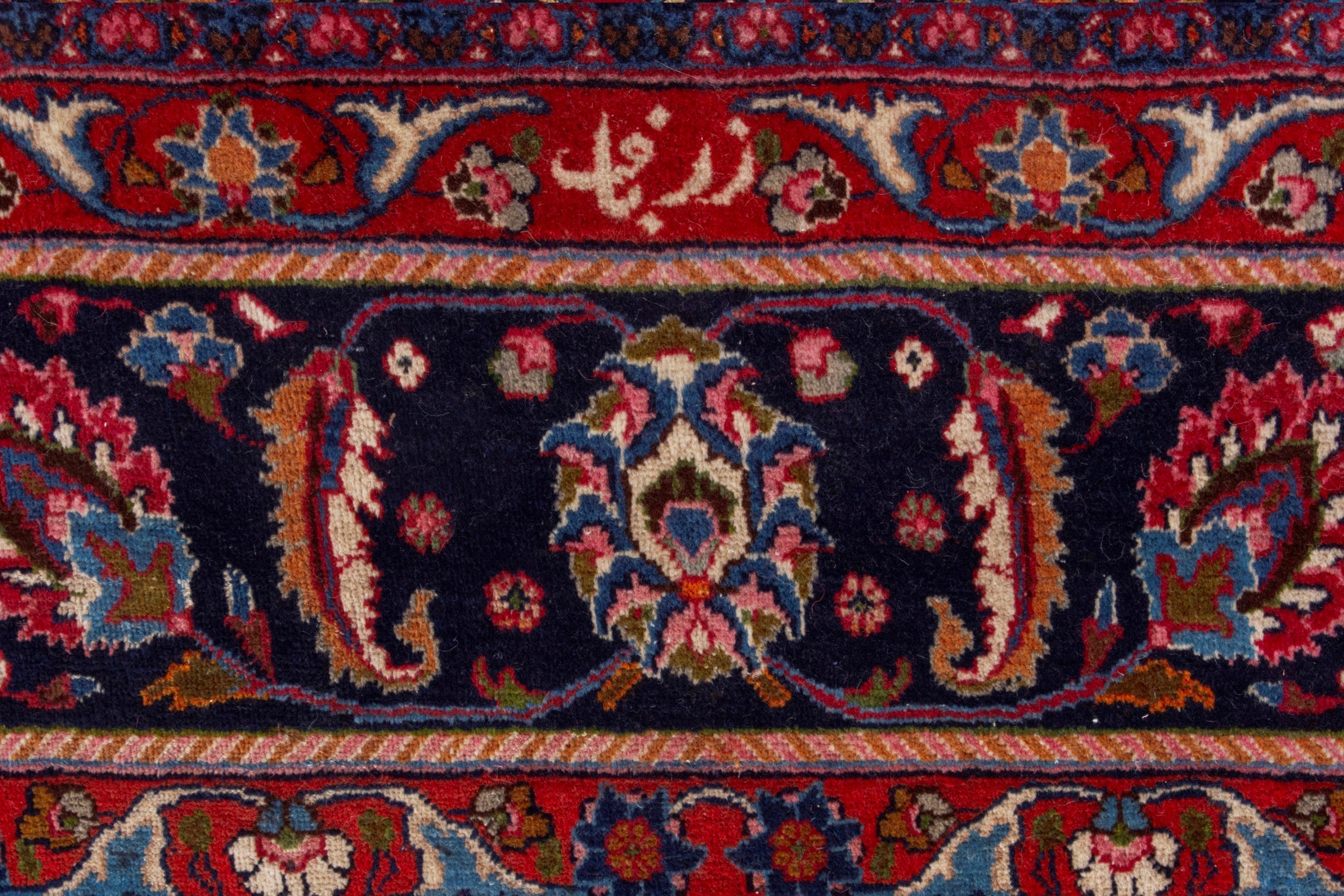 Persian Mashhad oversized rug in deep red and dark blue, view 11 of 22