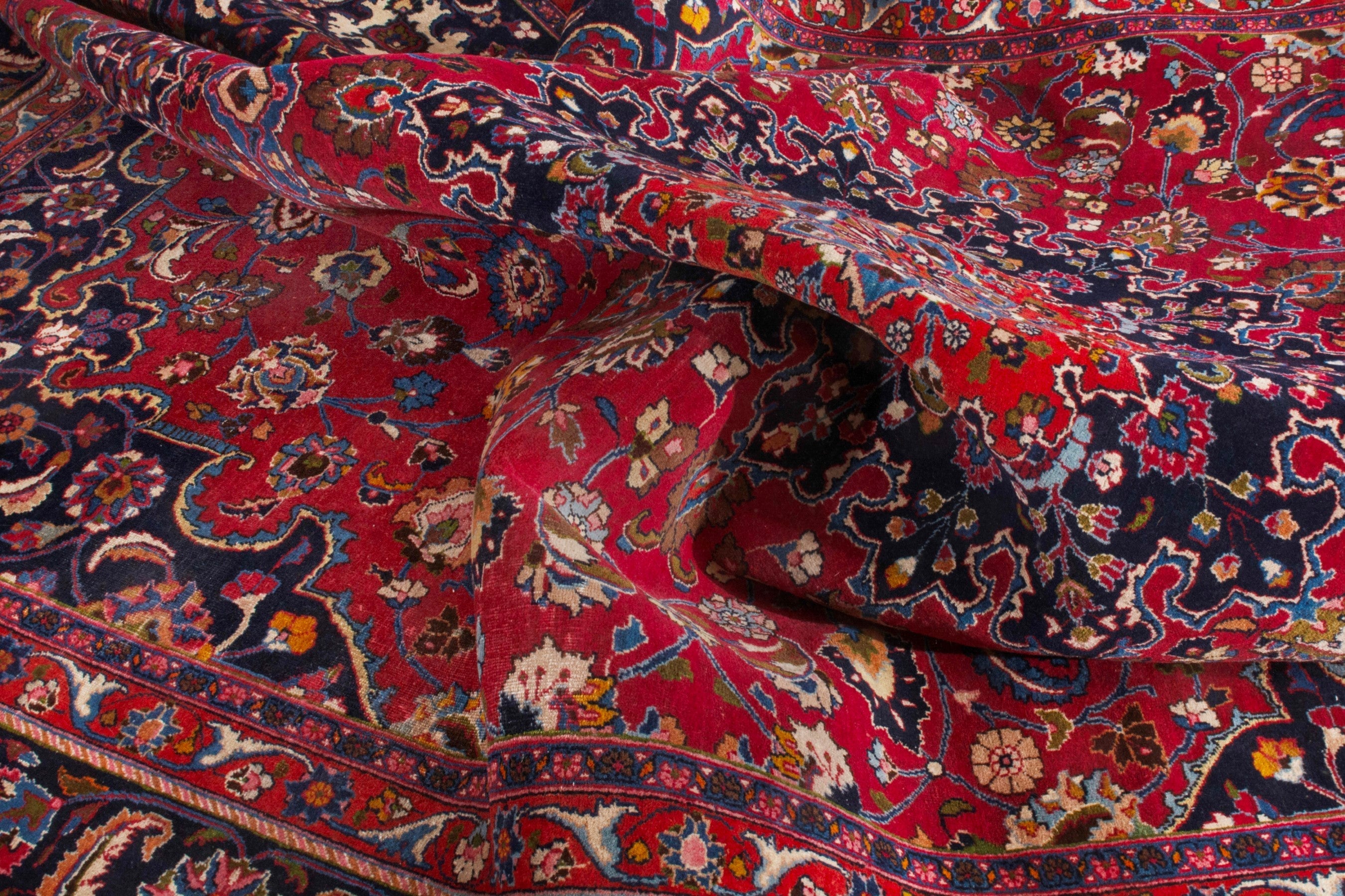 Persian Mashhad oversized rug in deep red and dark blue, view 18 of 22