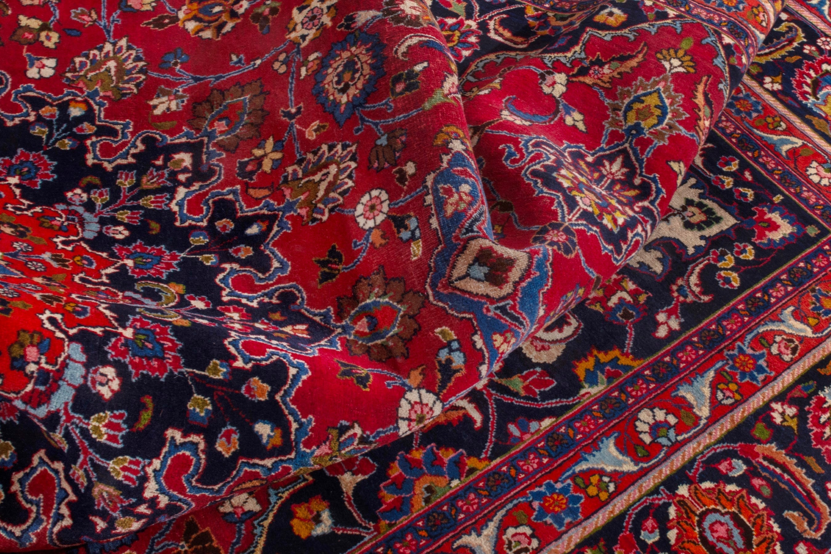 Persian Mashhad oversized rug in deep red and dark blue, view 19 of 22