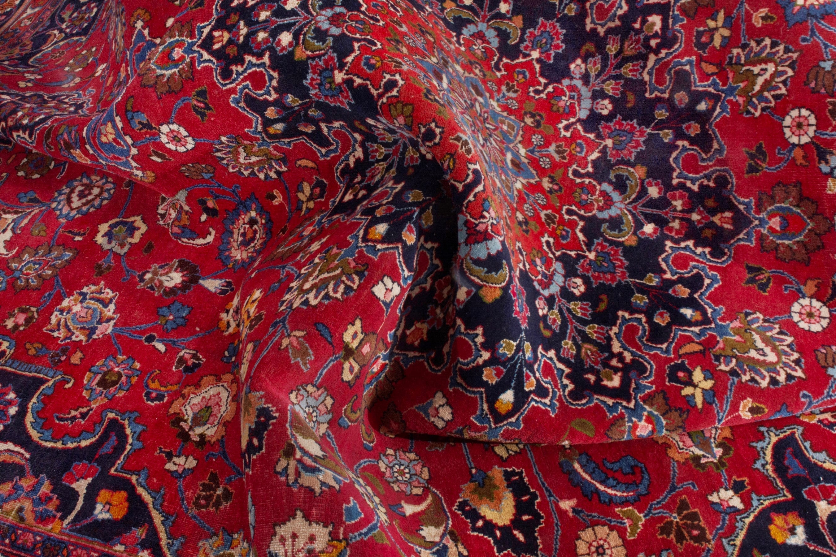Persian Mashhad oversized rug in deep red and dark blue, view 20 of 22