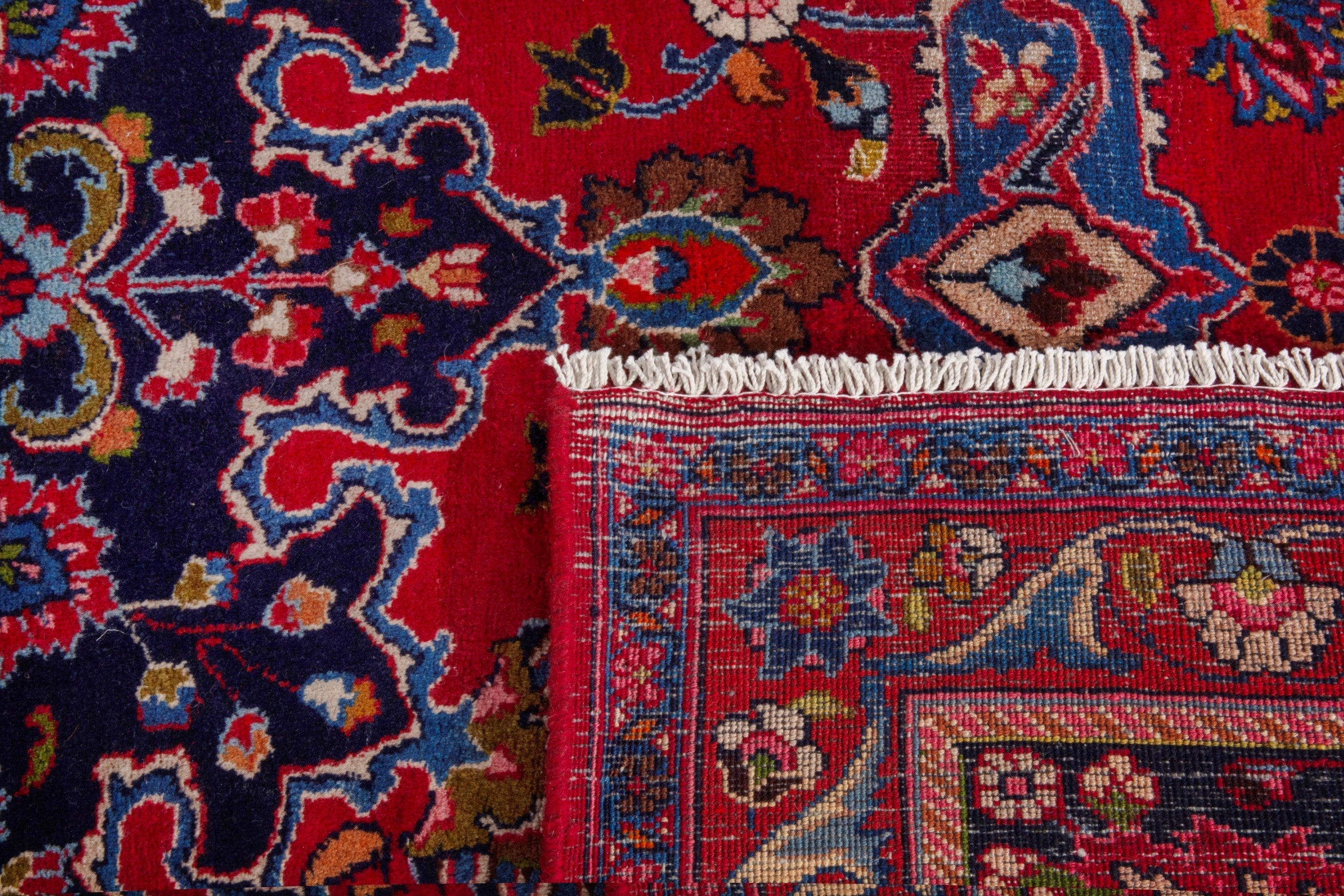Persian Mashhad oversized rug in deep red and dark blue, view 22 of 22