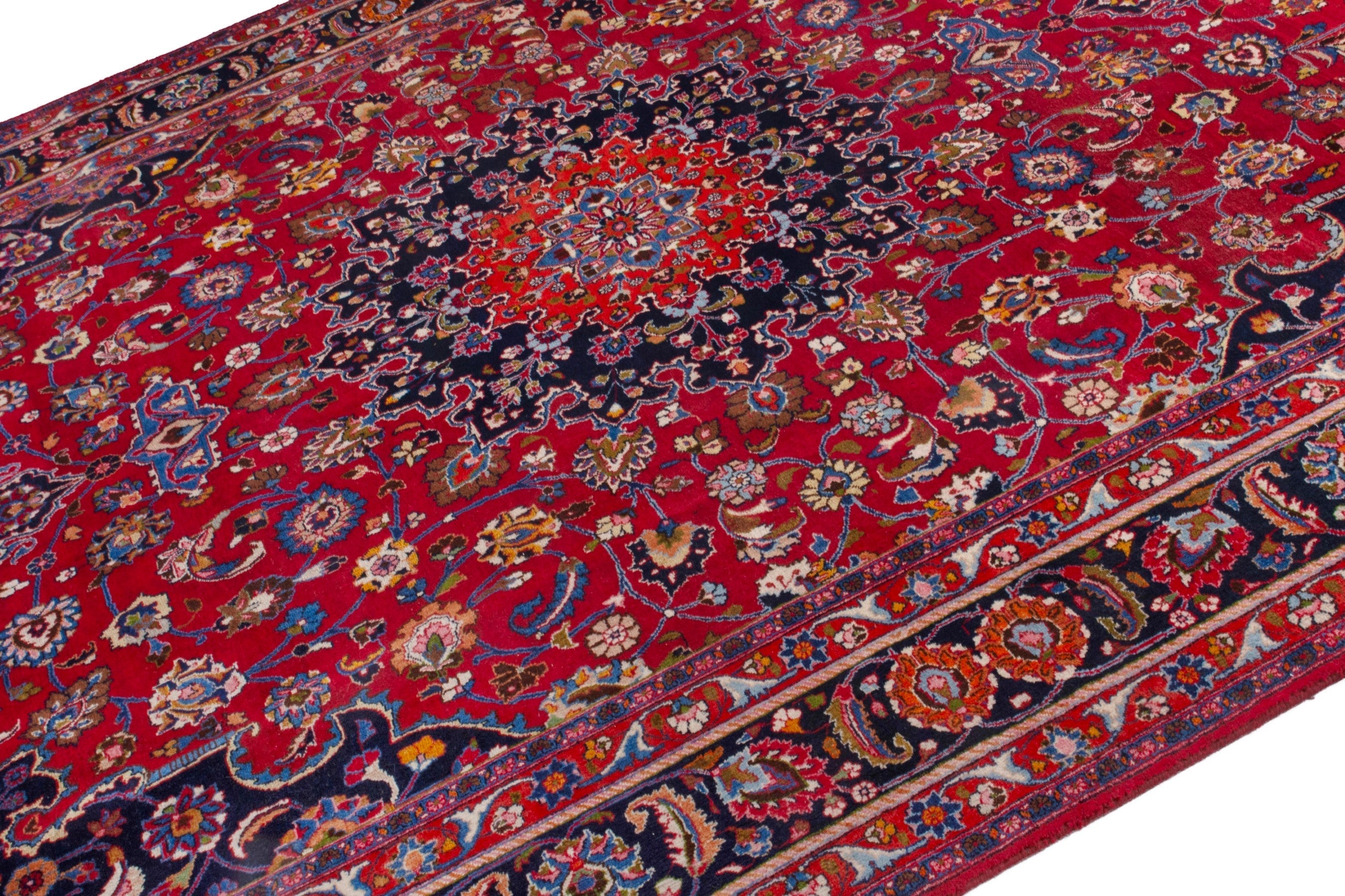 Persian Mashhad oversized rug in deep red and dark blue, view 5 of 22