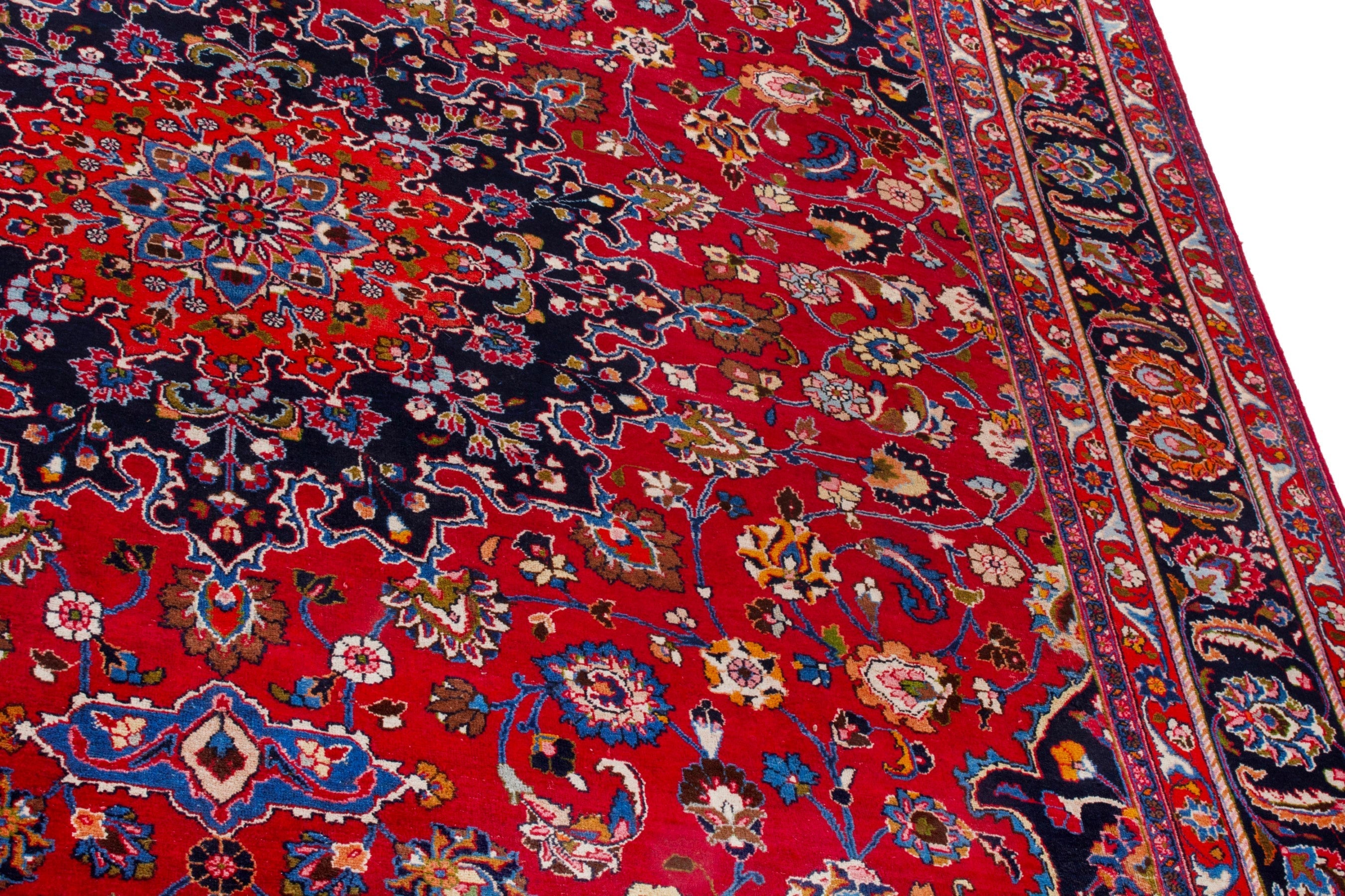 Persian Mashhad oversized rug in deep red and dark blue, view 7 of 22