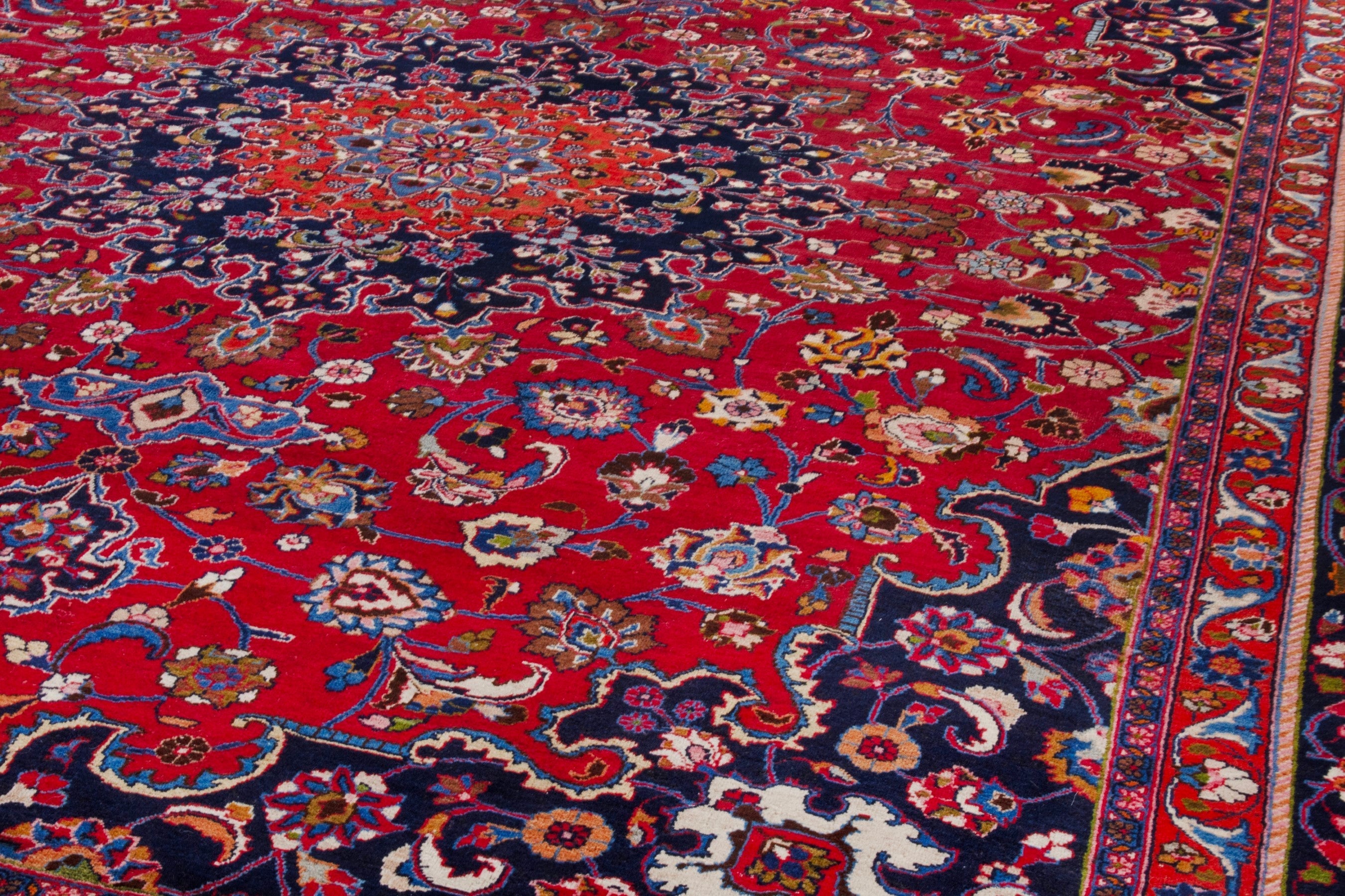 Persian Mashhad oversized rug in deep red and dark blue, view 8 of 22