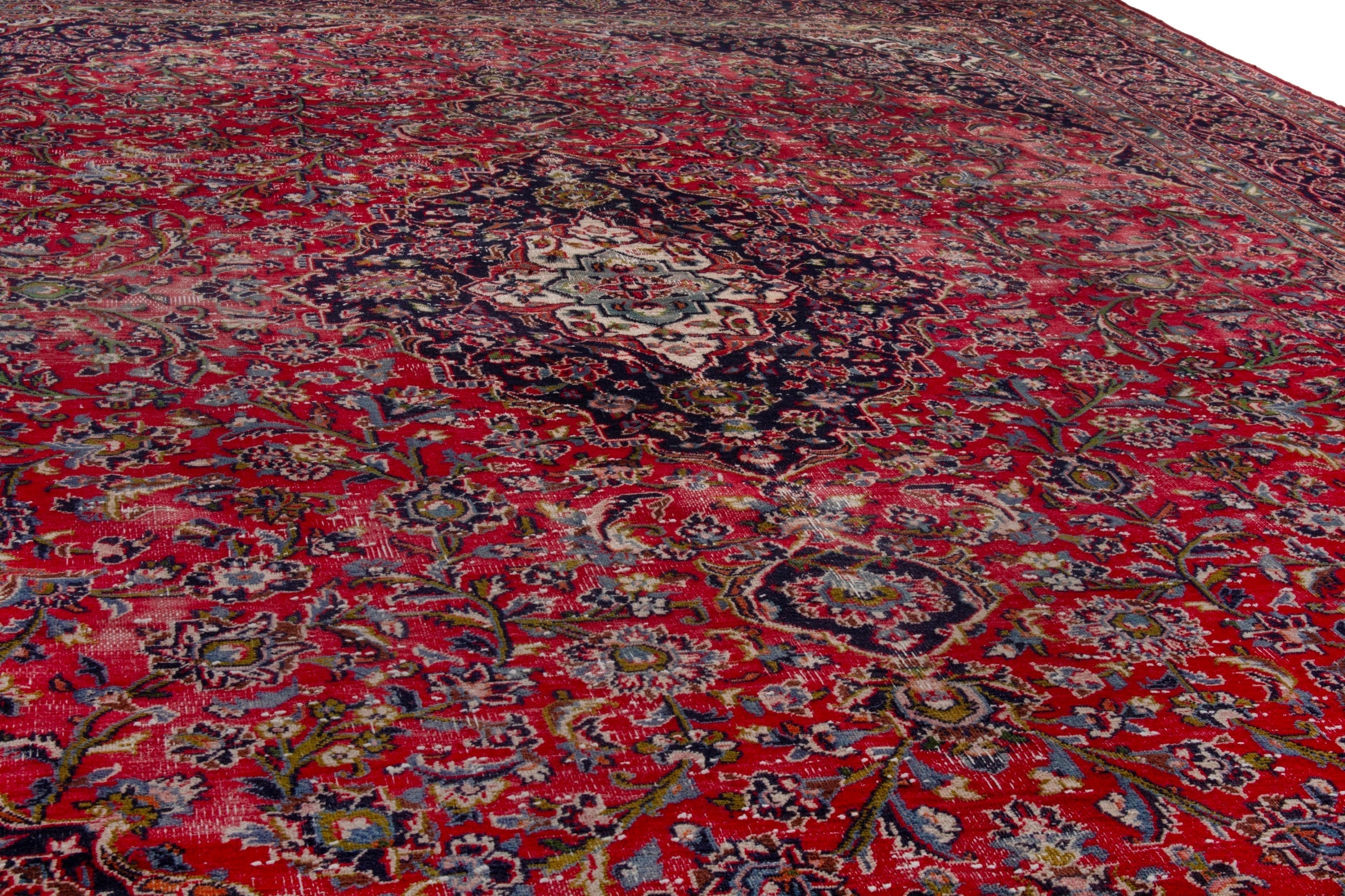 Persian Mashhad oversized rug in deep red and burgundy, view 9 of 19