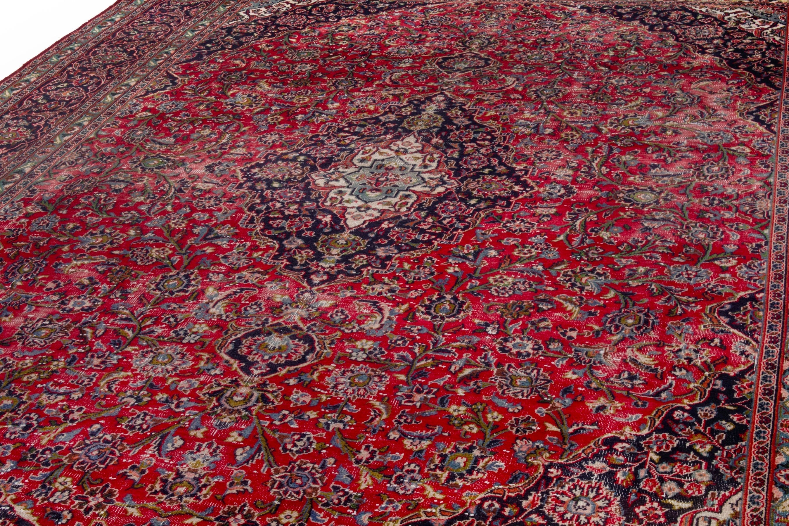 Persian Mashhad oversized rug in deep red and burgundy, view 8 of 19