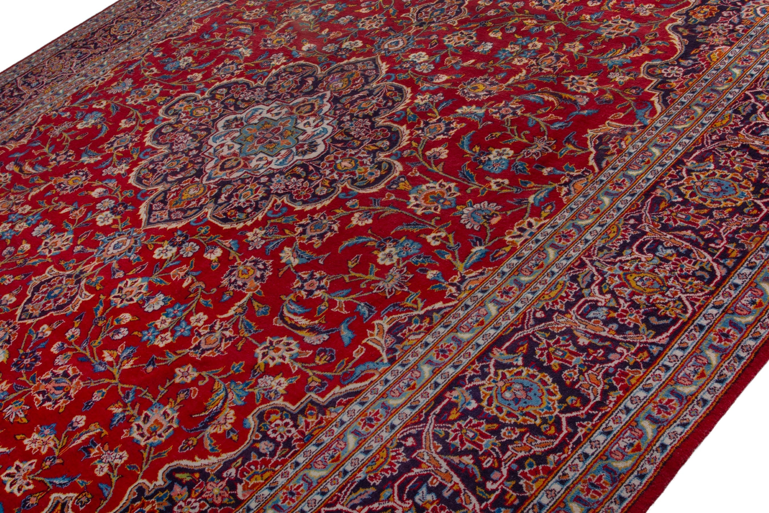 Persian Kashan oversized rug in deep red and burgundy, view 5 of 19