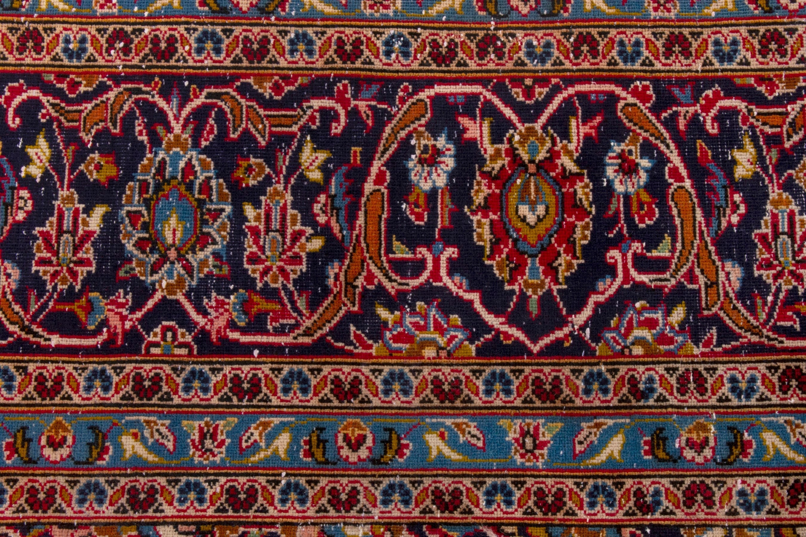 Persian Kashan oversized rug in deep red and navy, view 15 of 23