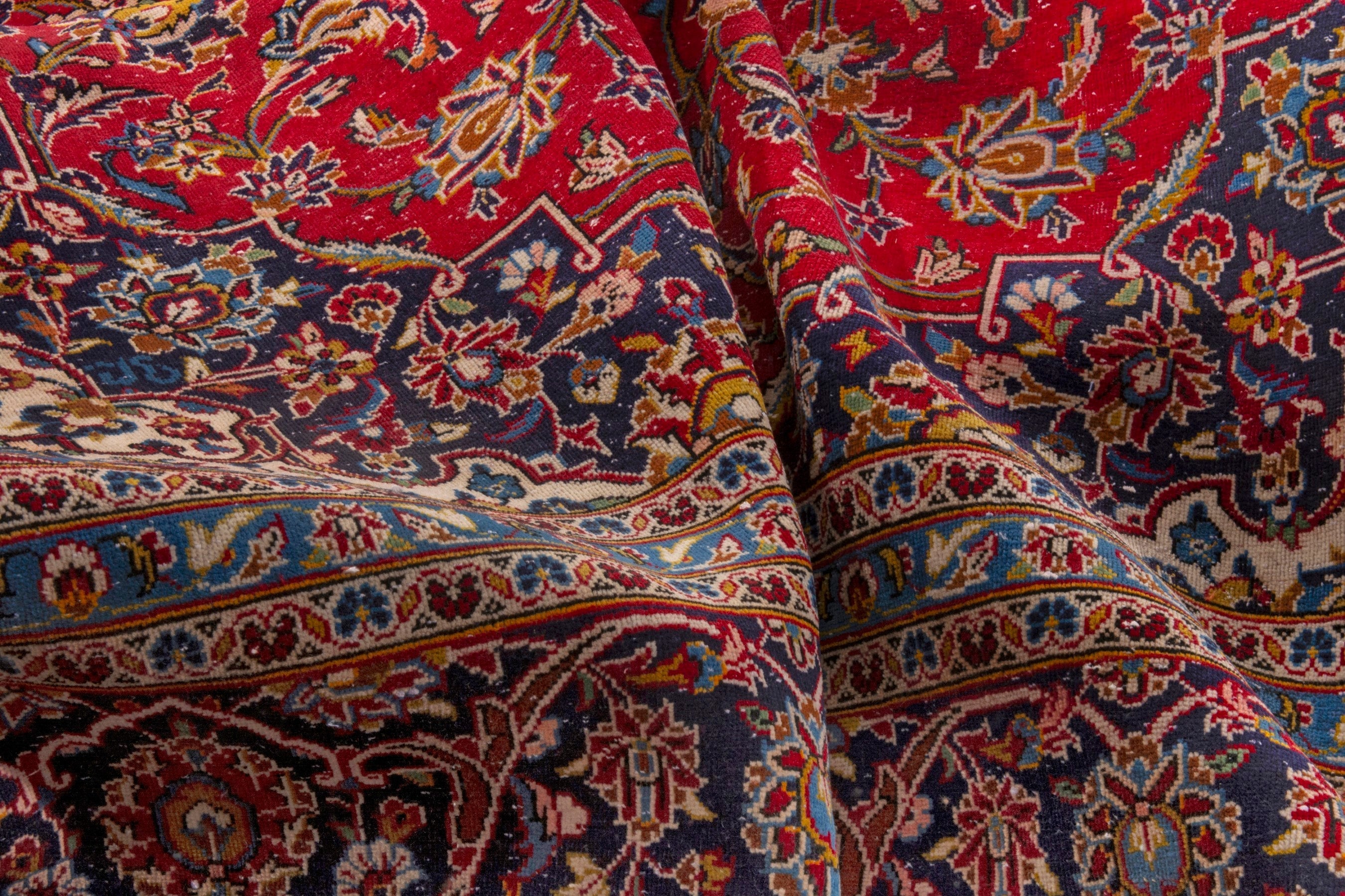 Persian Kashan oversized rug in deep red and navy, view 20 of 23
