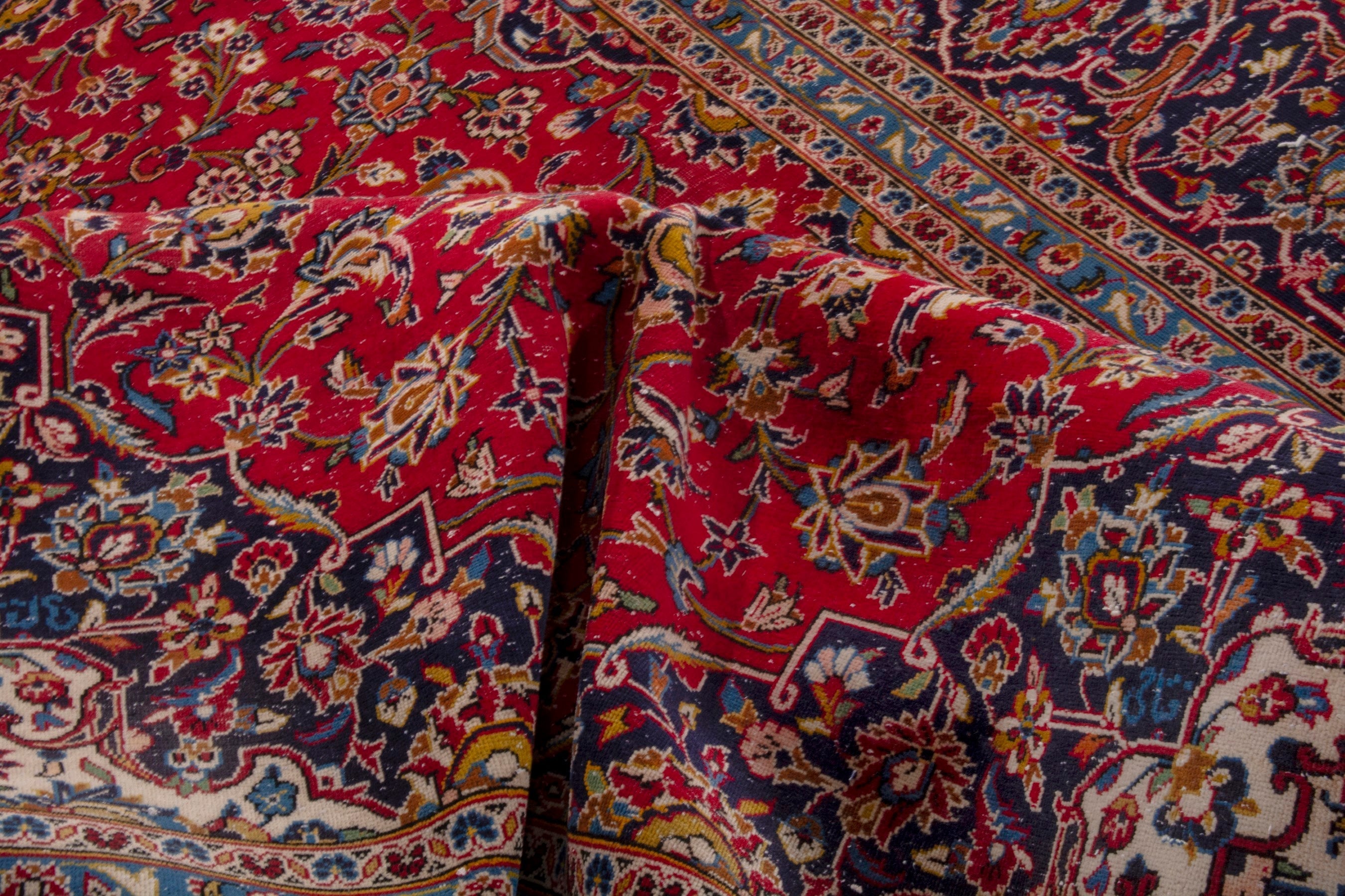 Persian Kashan oversized rug in deep red and navy, view 21 of 23