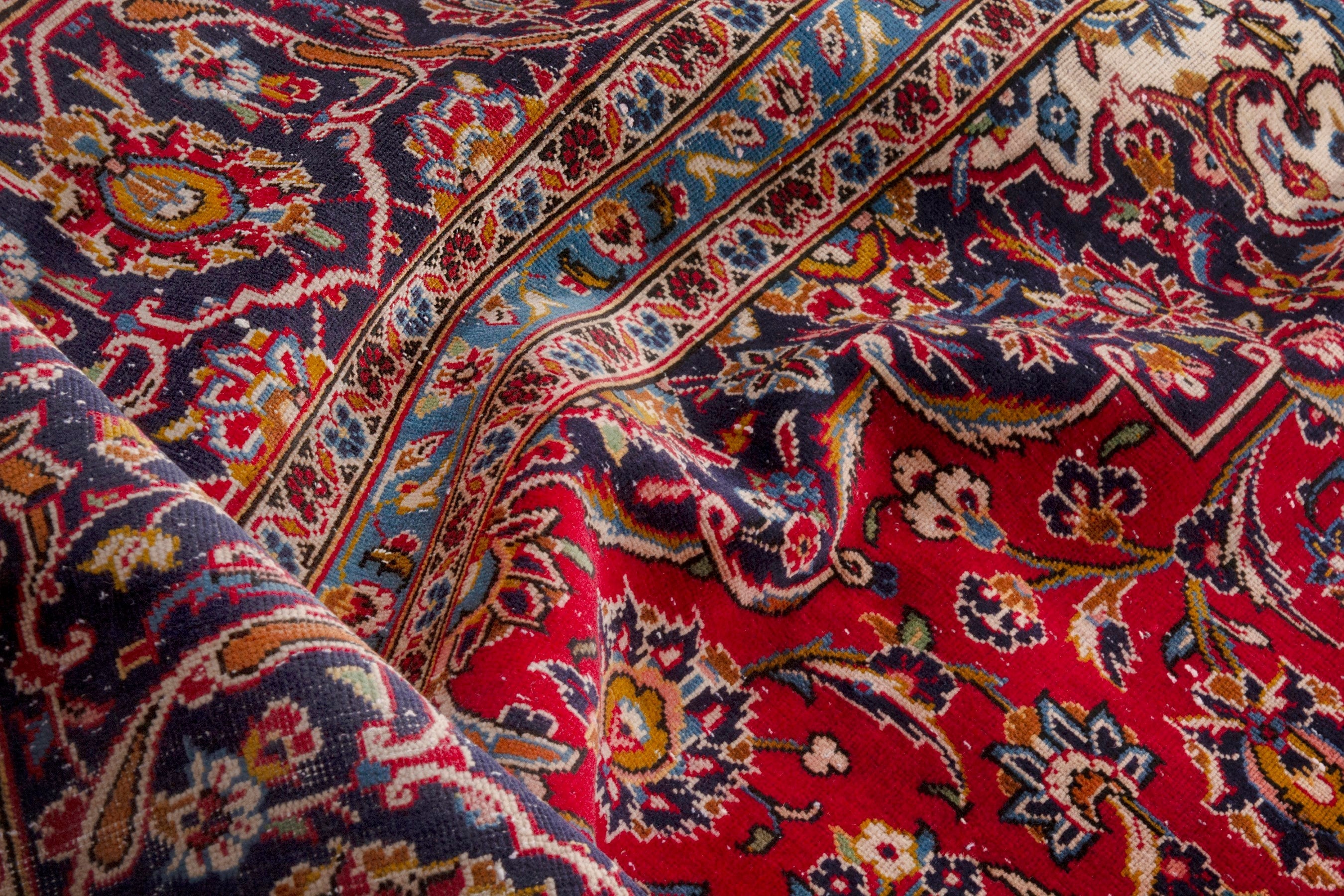 Persian Kashan oversized rug in deep red and navy, view 22 of 23