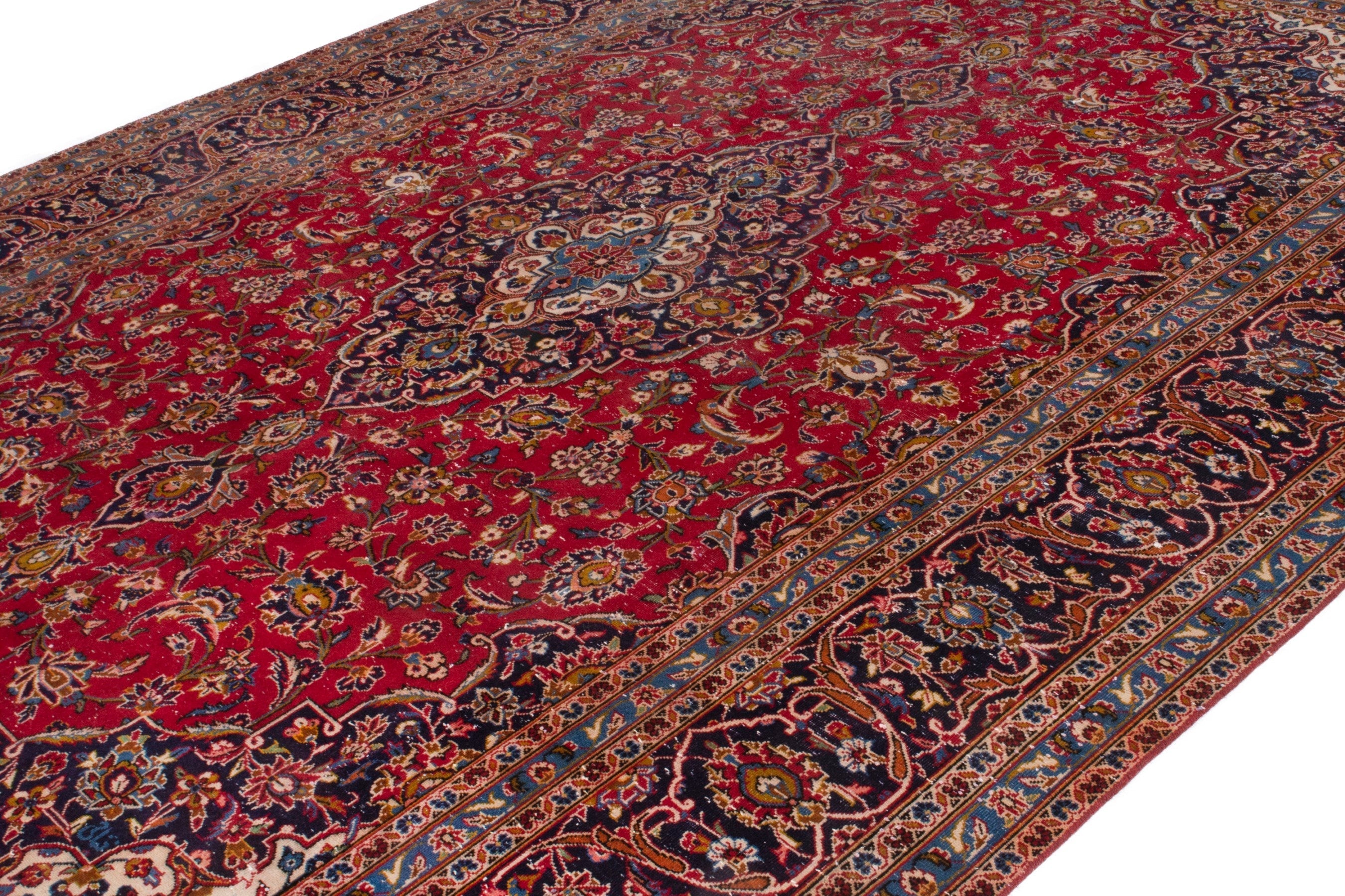 Persian Kashan oversized rug in deep red and navy, view 5 of 23