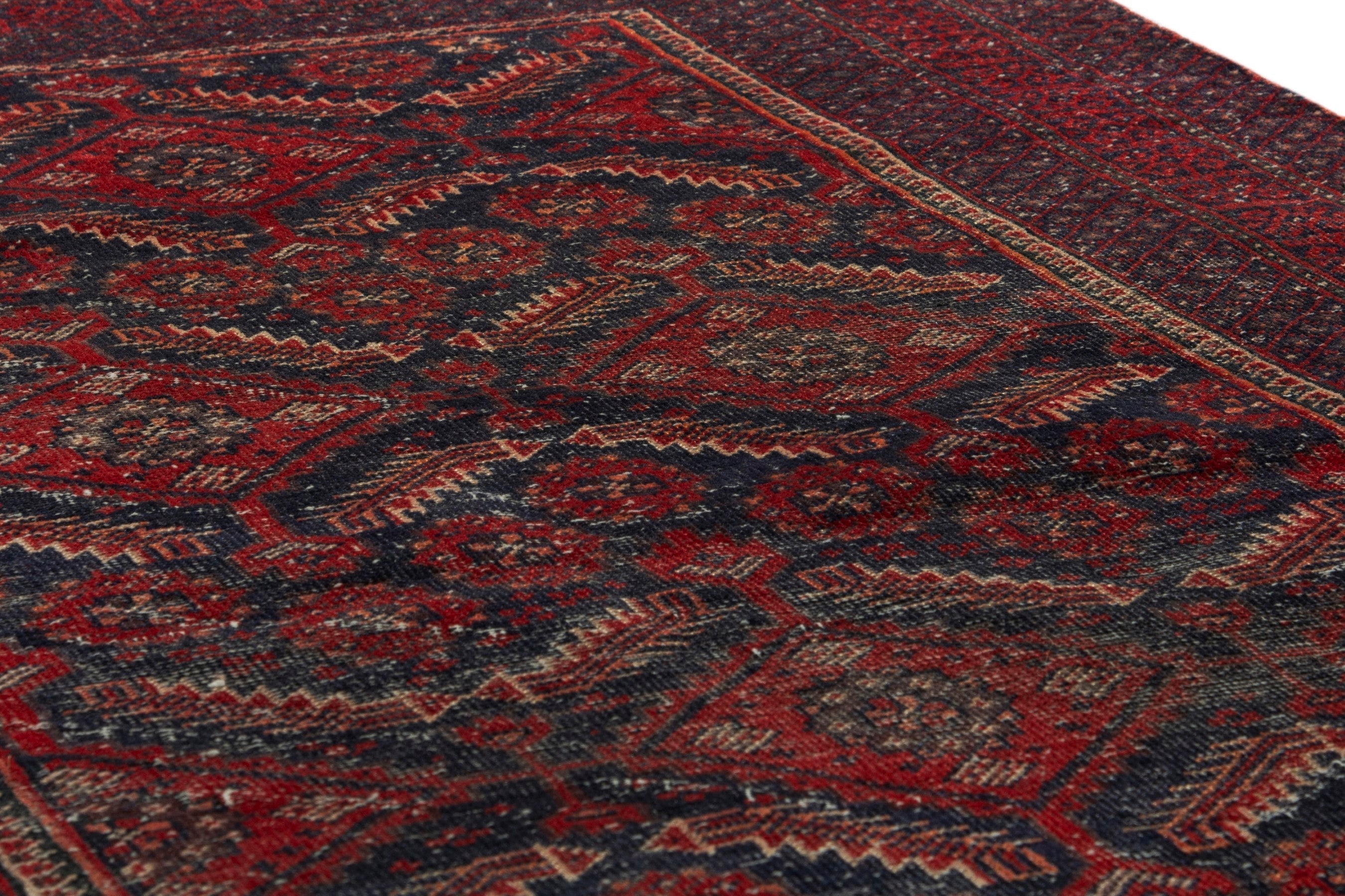 Persian Baluch accent rug in burgundy and deep red, view 9 of 18