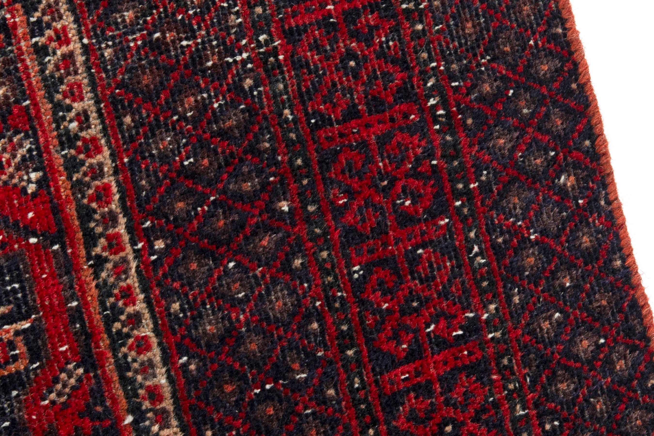 Persian Baluch accent rug in burgundy and deep red, view 7 of 18