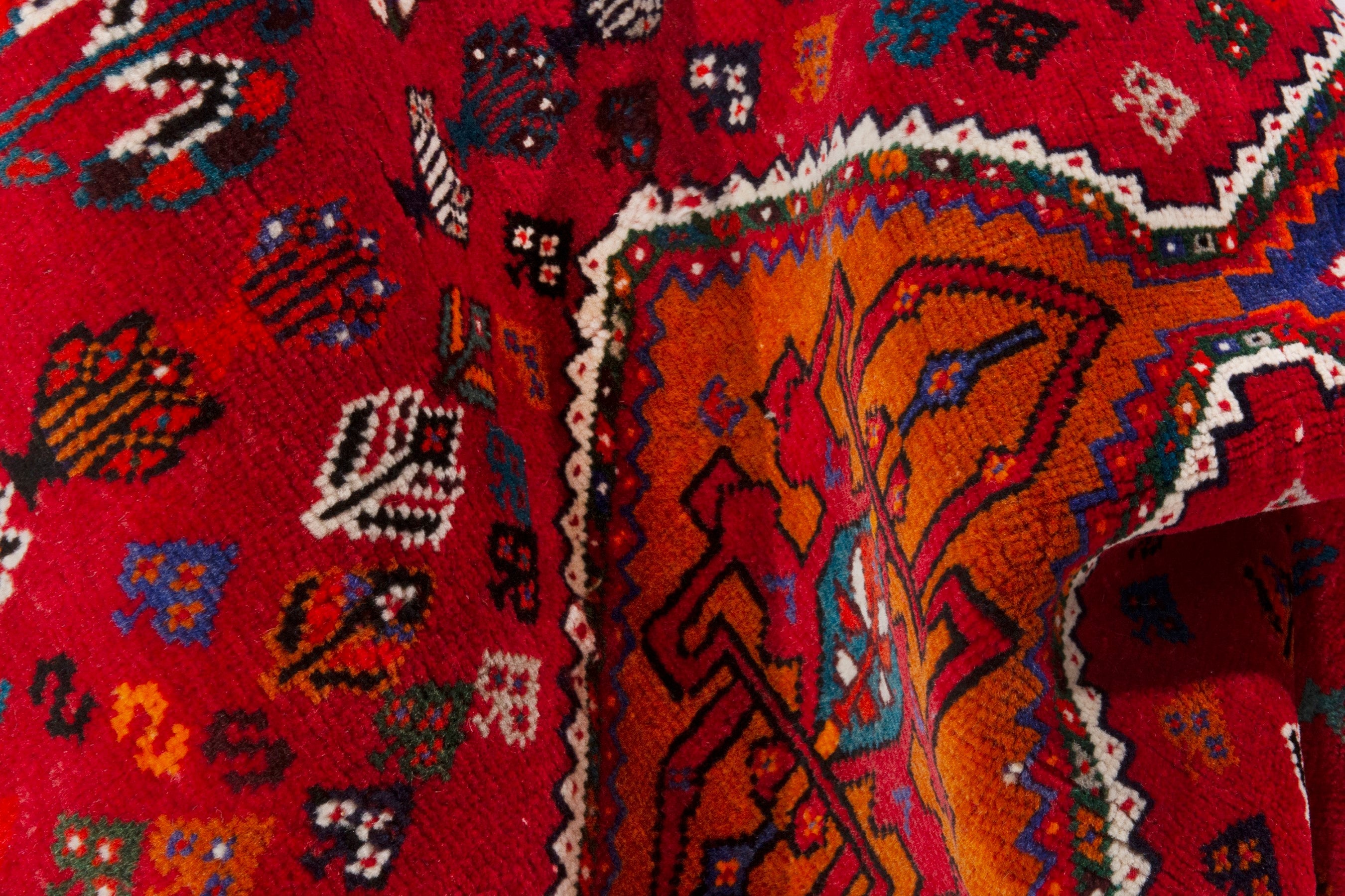 Persian Shiraz accent rug in deep red and denim, view 11 of 12