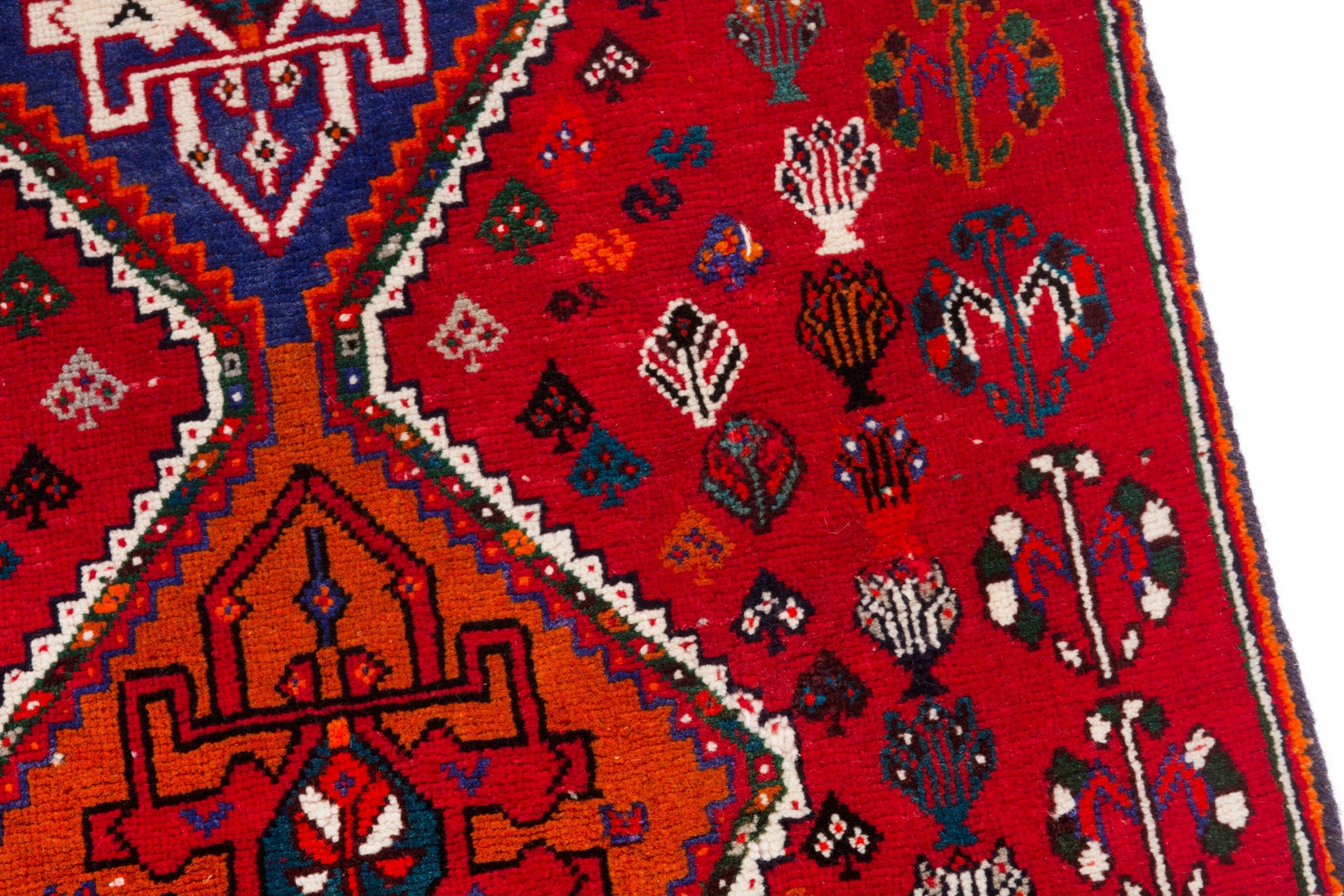 Persian Shiraz accent rug in deep red and denim, view 7 of 12