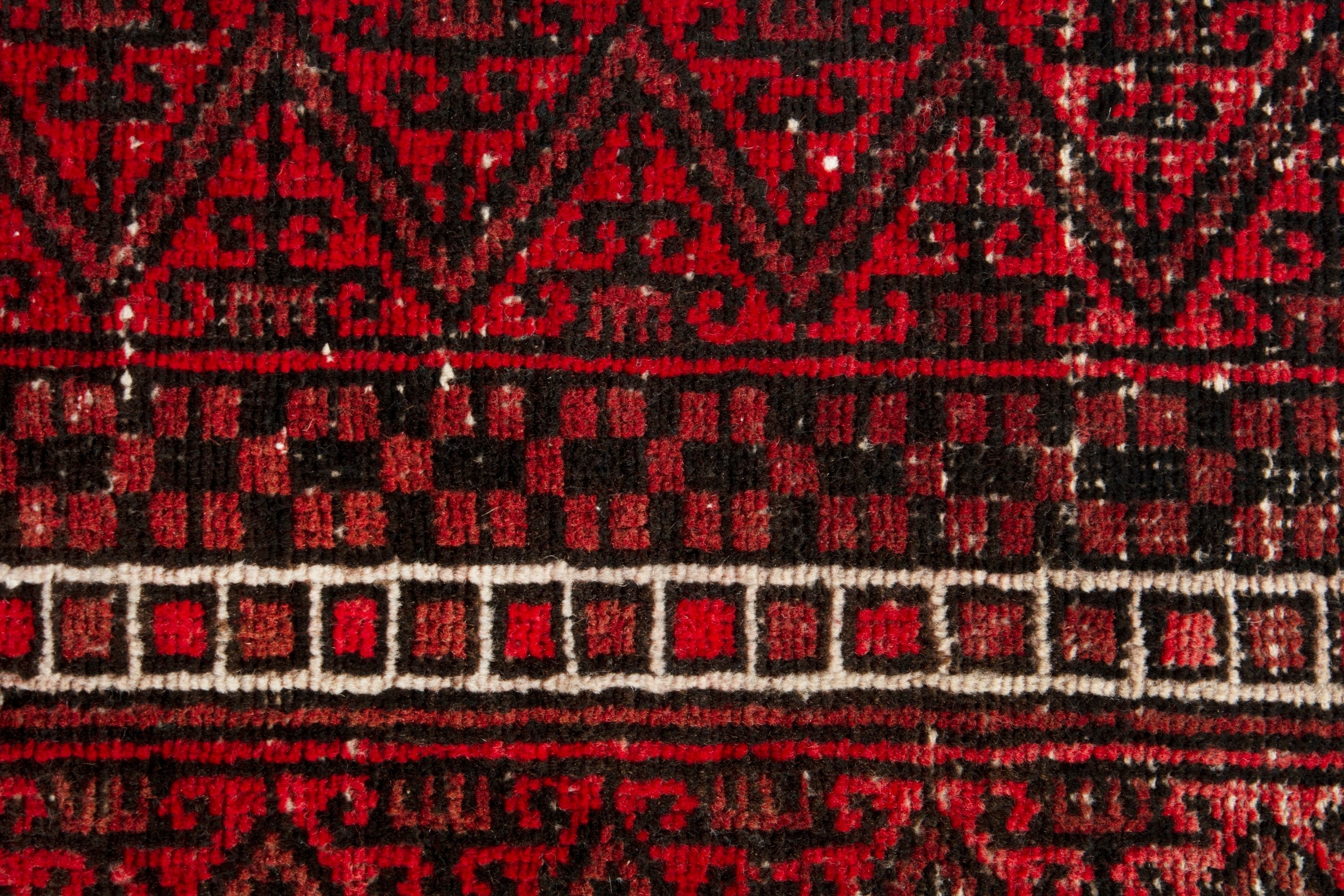 Persian Baluch accent rug in deep red and burgundy, view 11 of 17