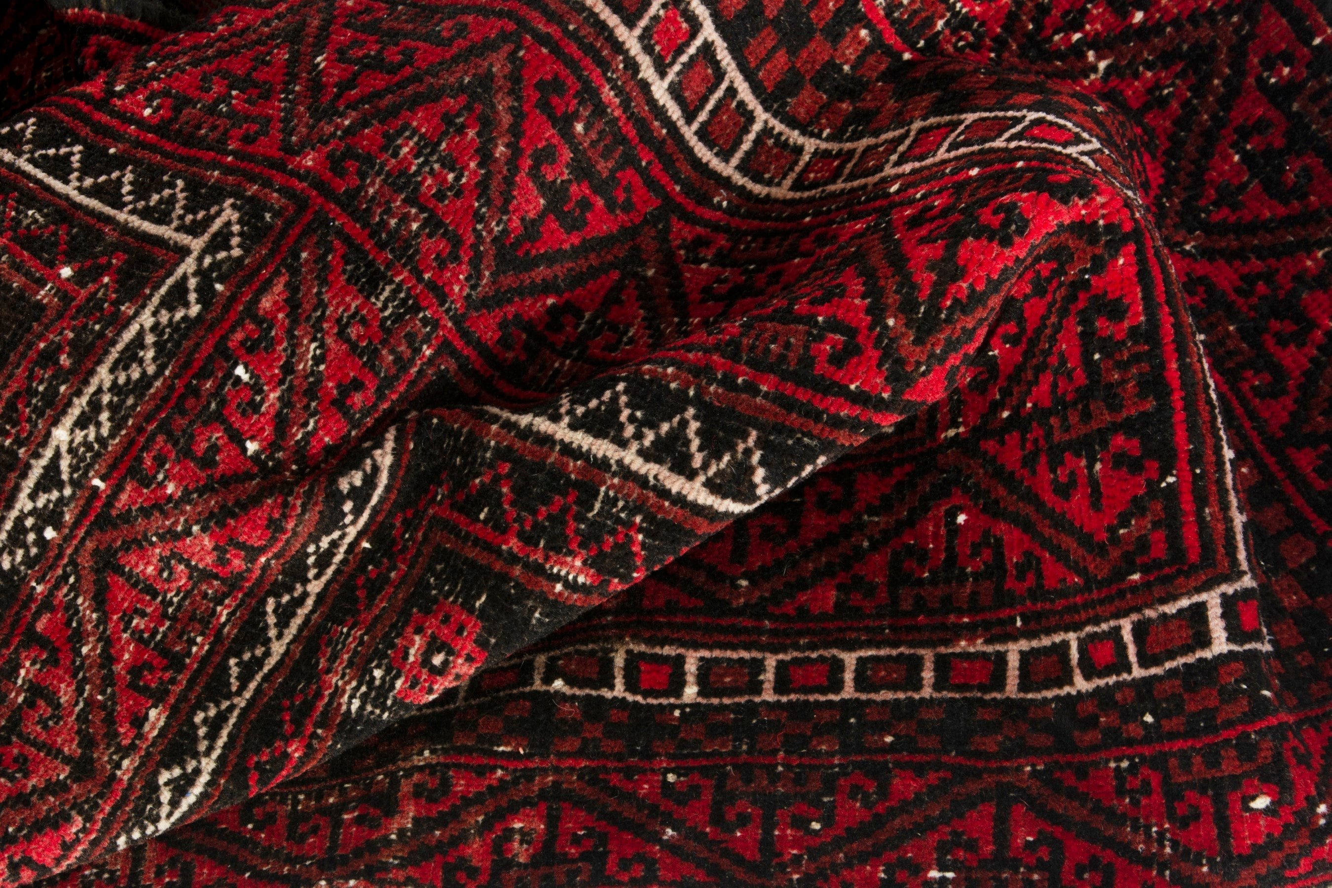 Persian Baluch accent rug in deep red and burgundy, view 15 of 17