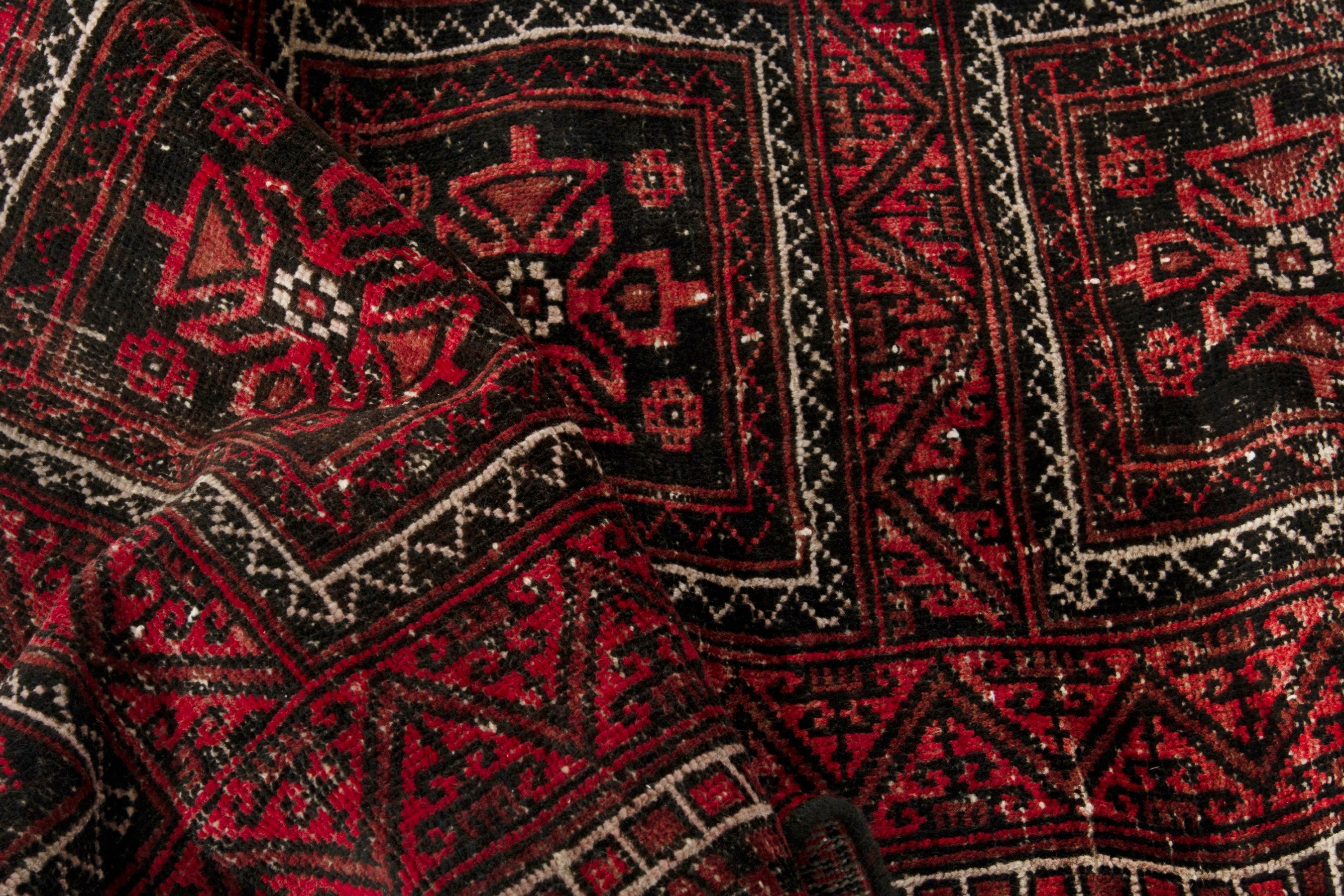 Persian Baluch accent rug in deep red and burgundy, view 16 of 17