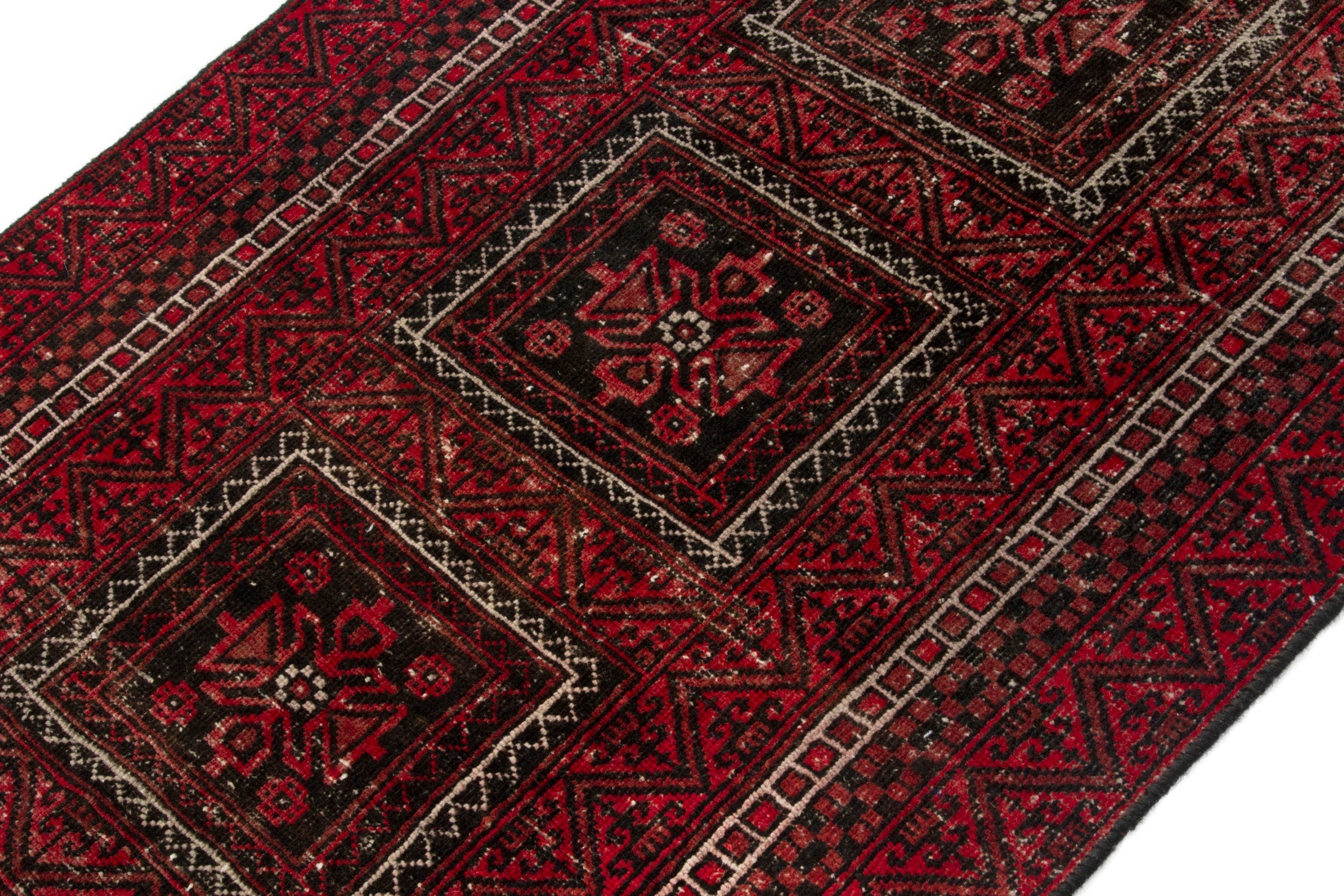 Persian Baluch accent rug in deep red and burgundy, view 5 of 17