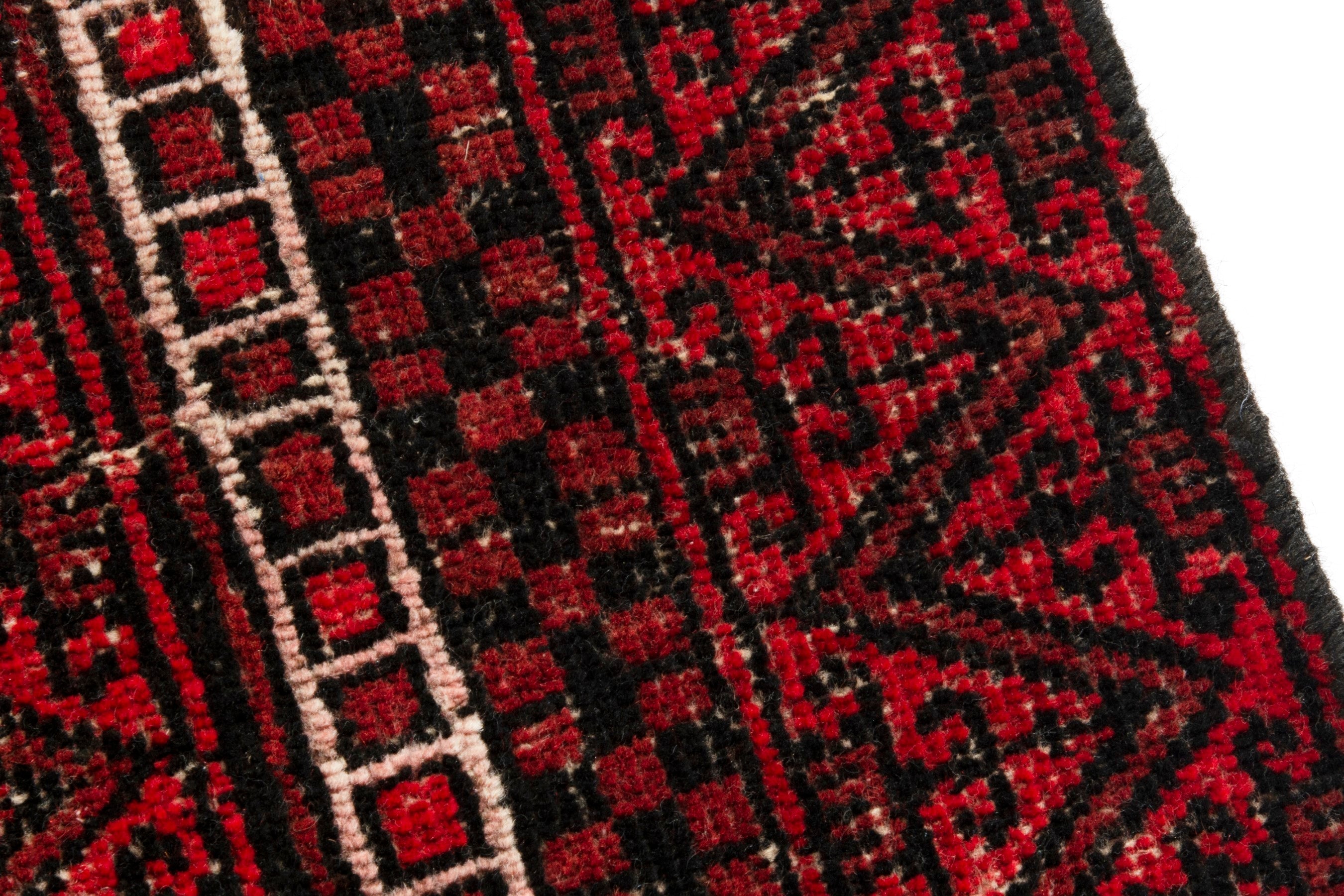 Persian Baluch accent rug in deep red and burgundy, view 7 of 17