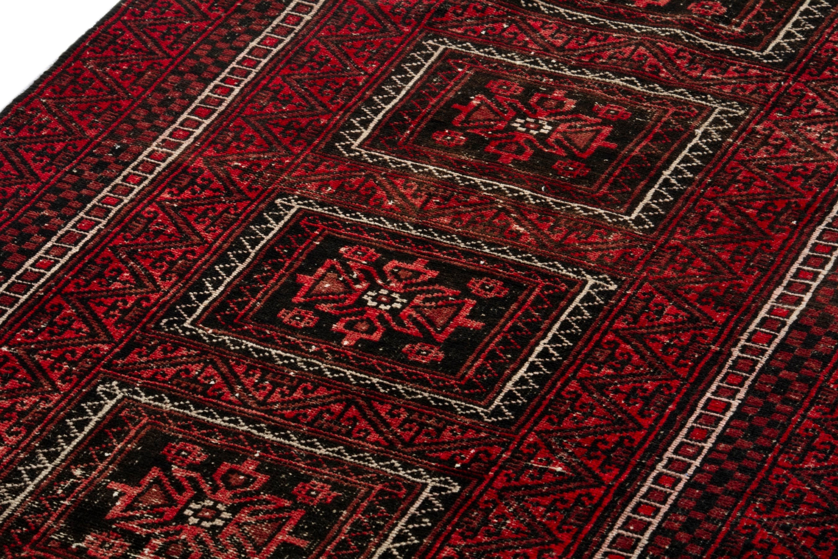 Persian Baluch accent rug in deep red and burgundy, view 8 of 17