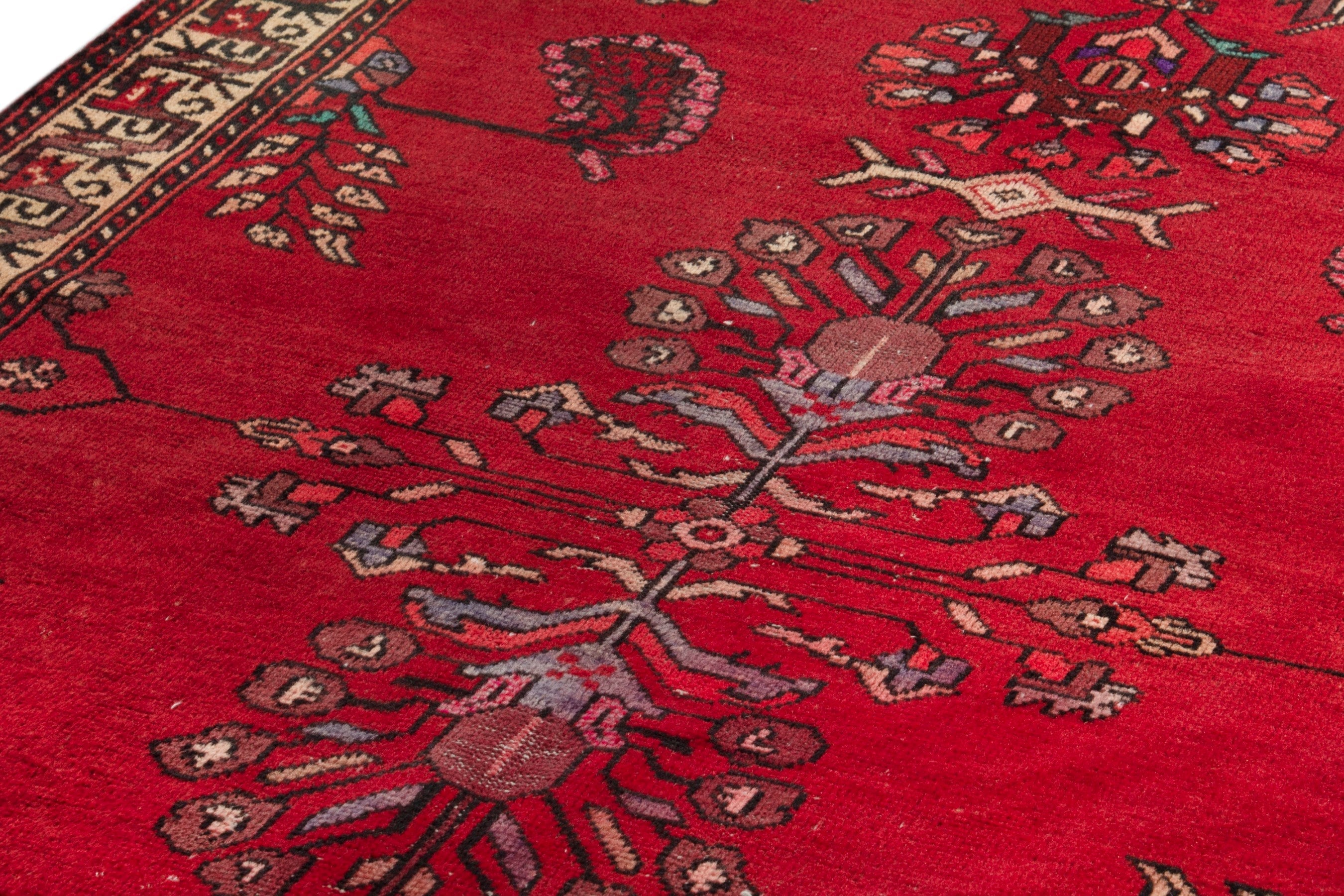 Persian Ferdos area rug in deep red and burgundy, view 7 of 17