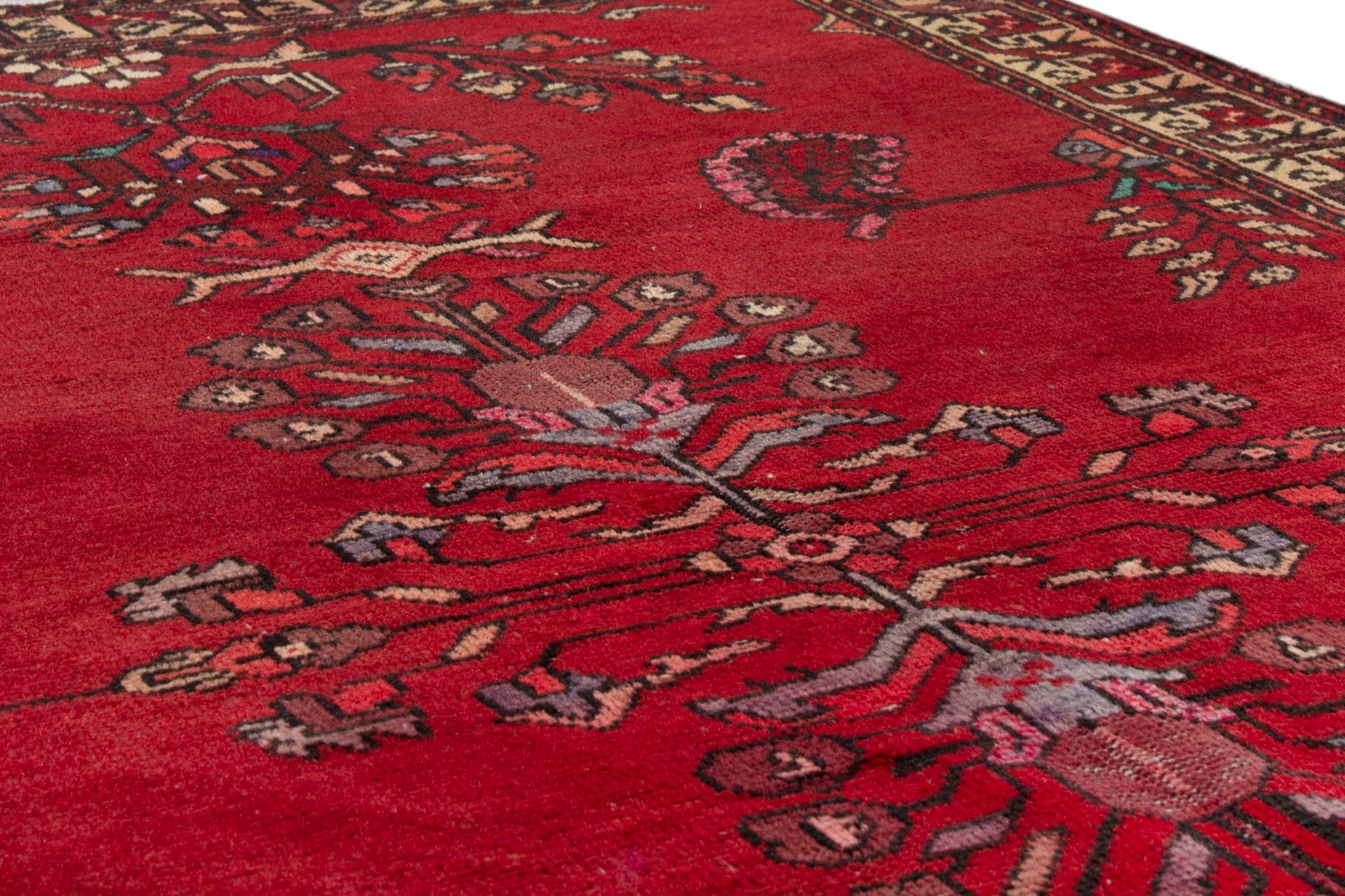 Persian Ferdos area rug in deep red and burgundy, view 8 of 17