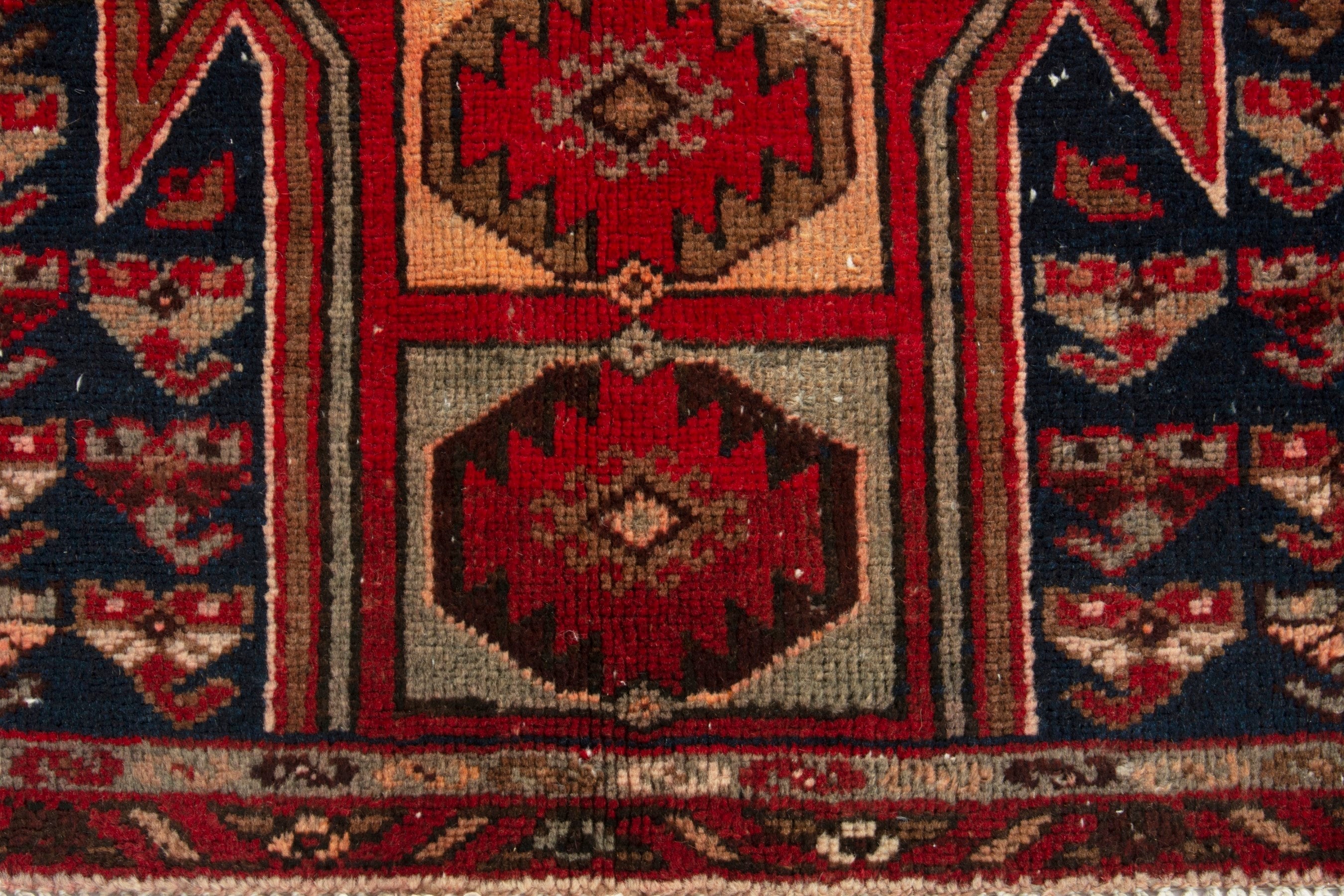 Persian Saveh accent rug in deep red and navy, view 10 of 17