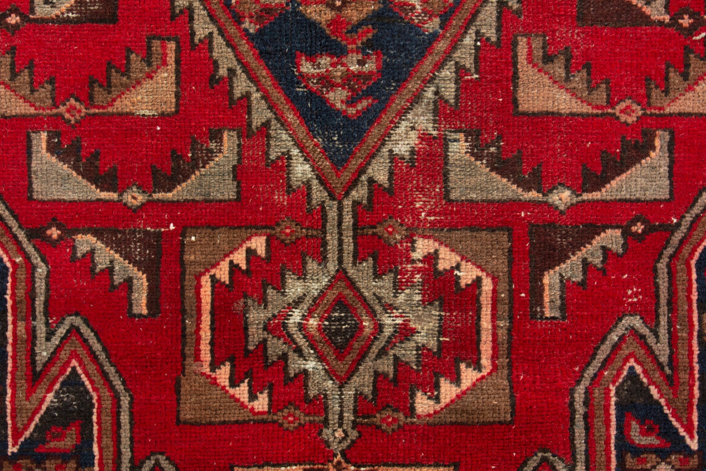 Persian Saveh accent rug in deep red and navy, view 11 of 17