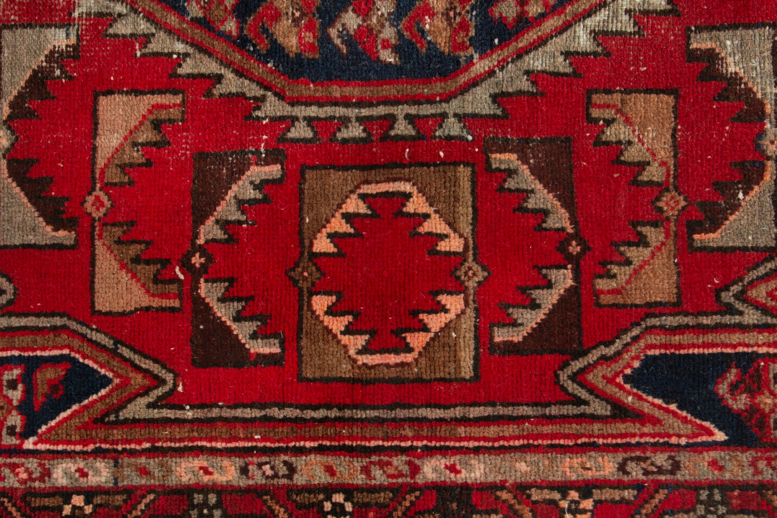 Persian Saveh accent rug in deep red and navy, view 12 of 17