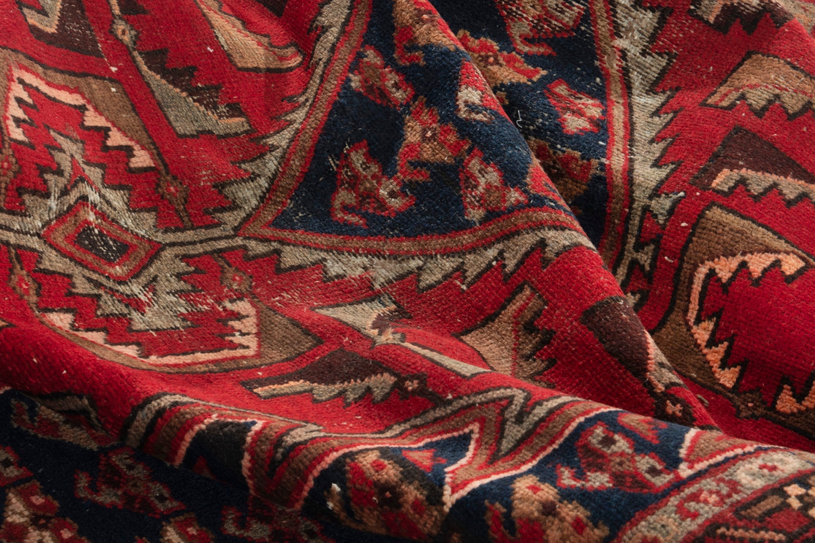 Persian Saveh accent rug in deep red and navy, view 14 of 17