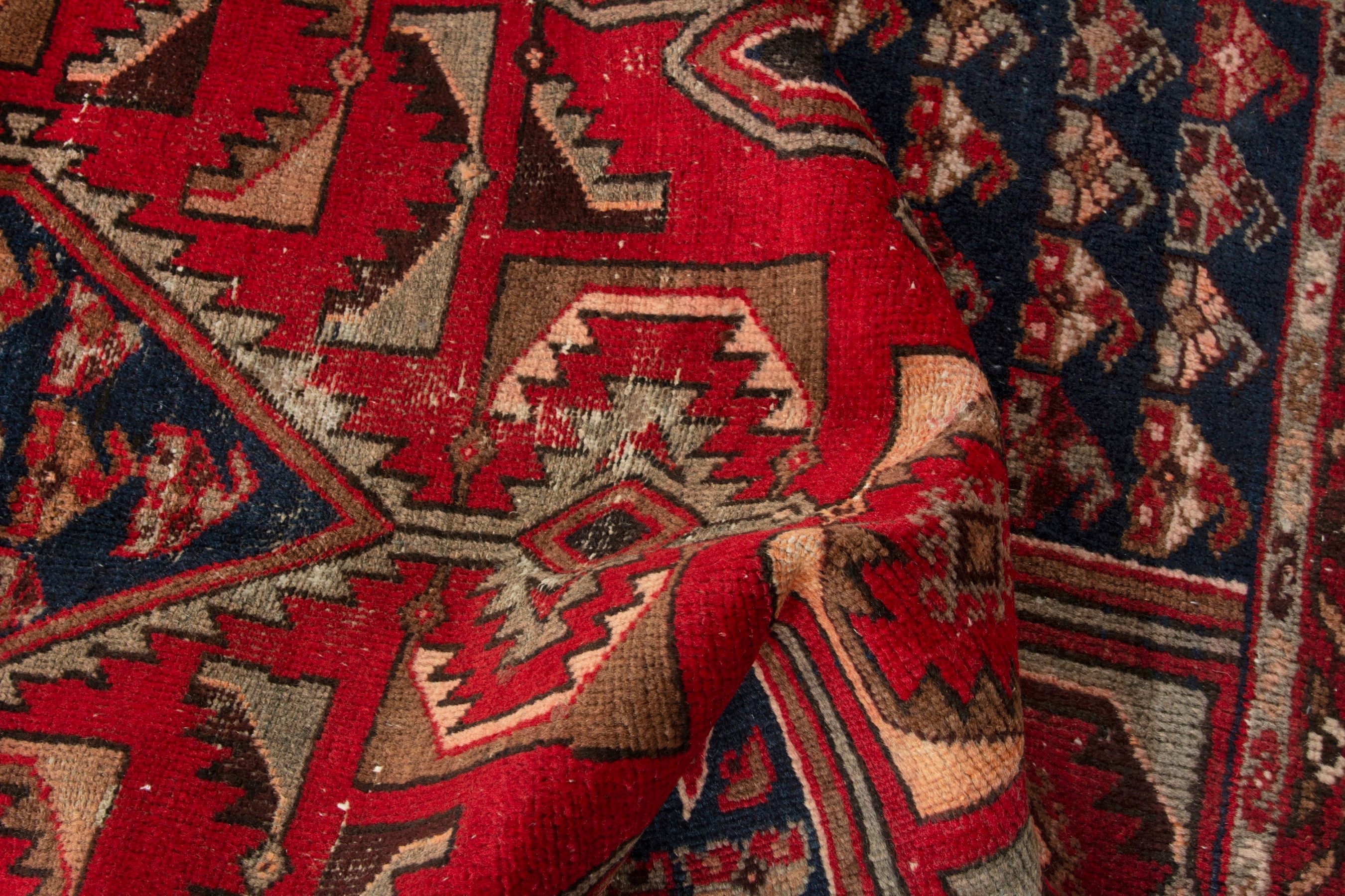 Persian Saveh accent rug in deep red and navy, view 16 of 17