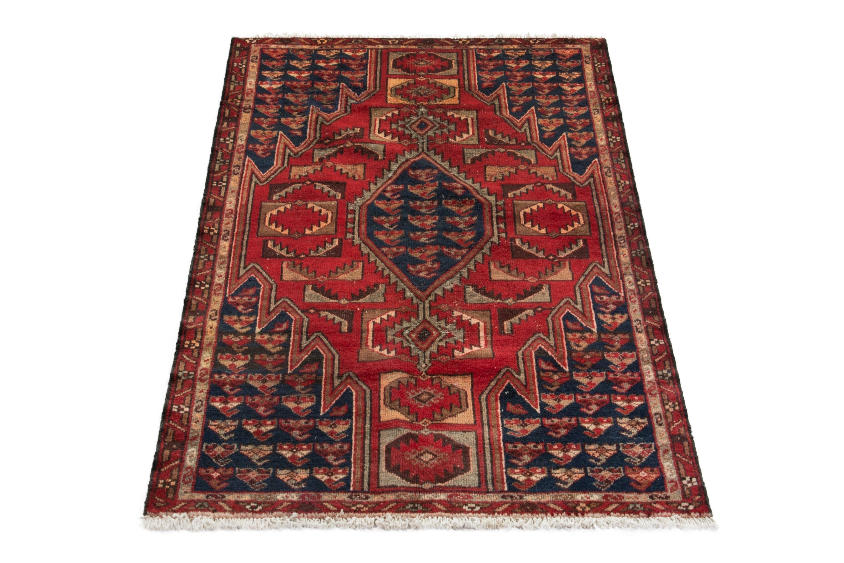 Persian Saveh accent rug in deep red and navy, view 2 of 17
